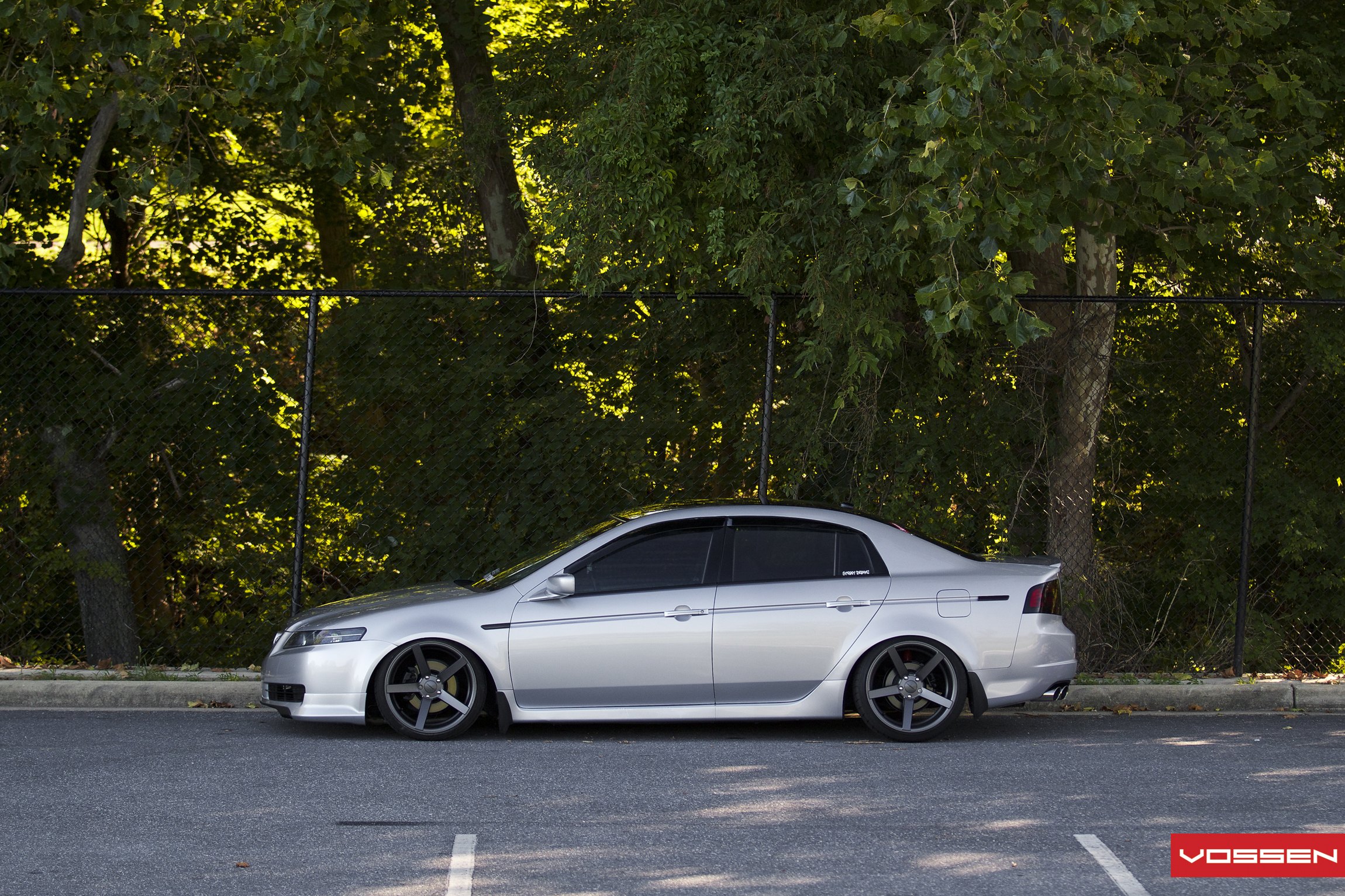 Silver Acura TL on Custom Dark Smoke Vossen Rims - Photo by Vossen