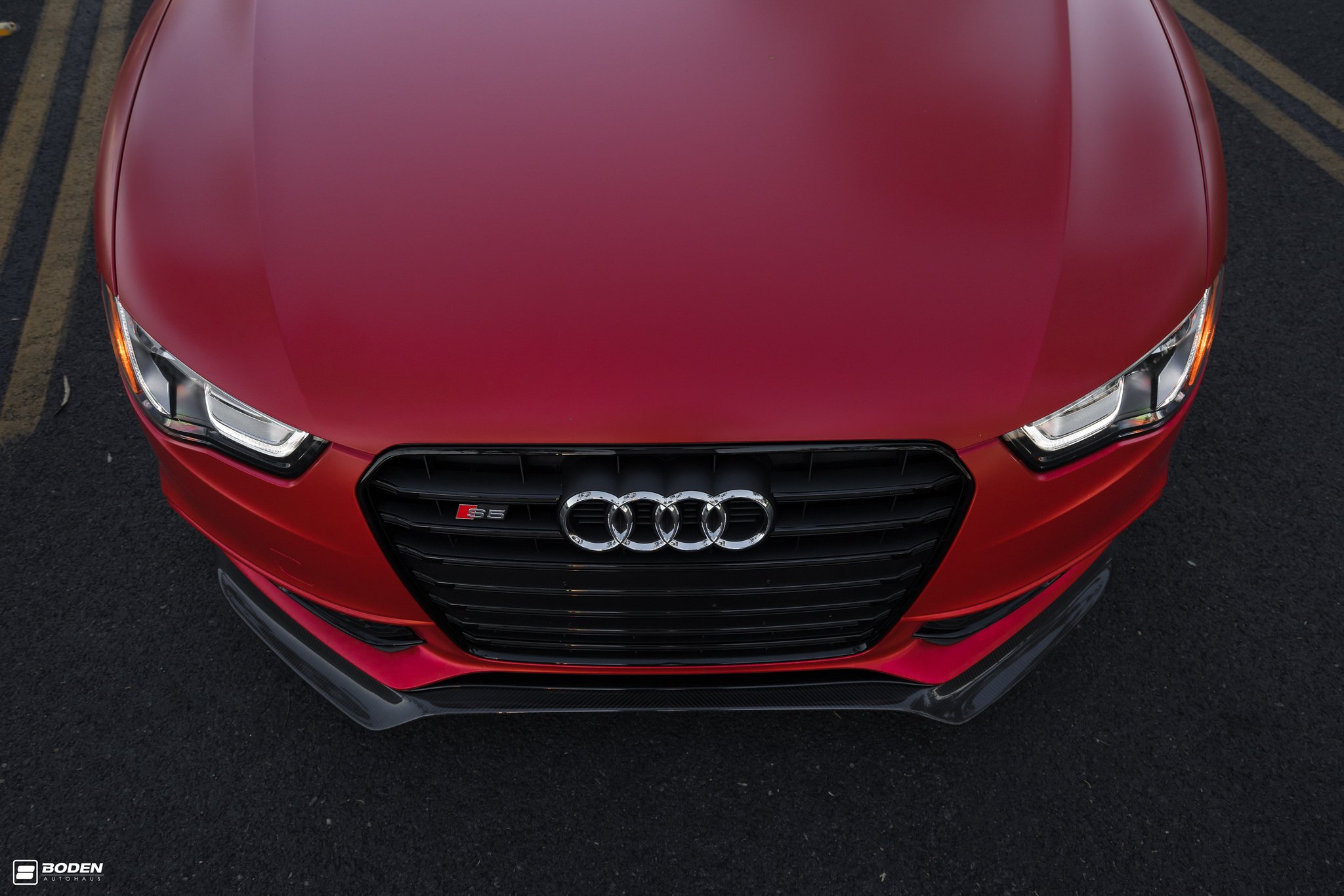 Carbon Fiber Front Bumper Lip on Matte Red Audi S5 - Photo by Boden Autohaus