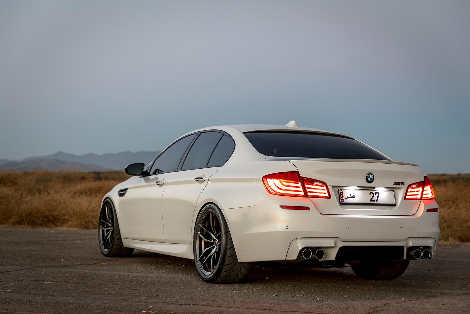 Red LED Taillights on White Matte BMW 5-Series - Photo by Vorstiner