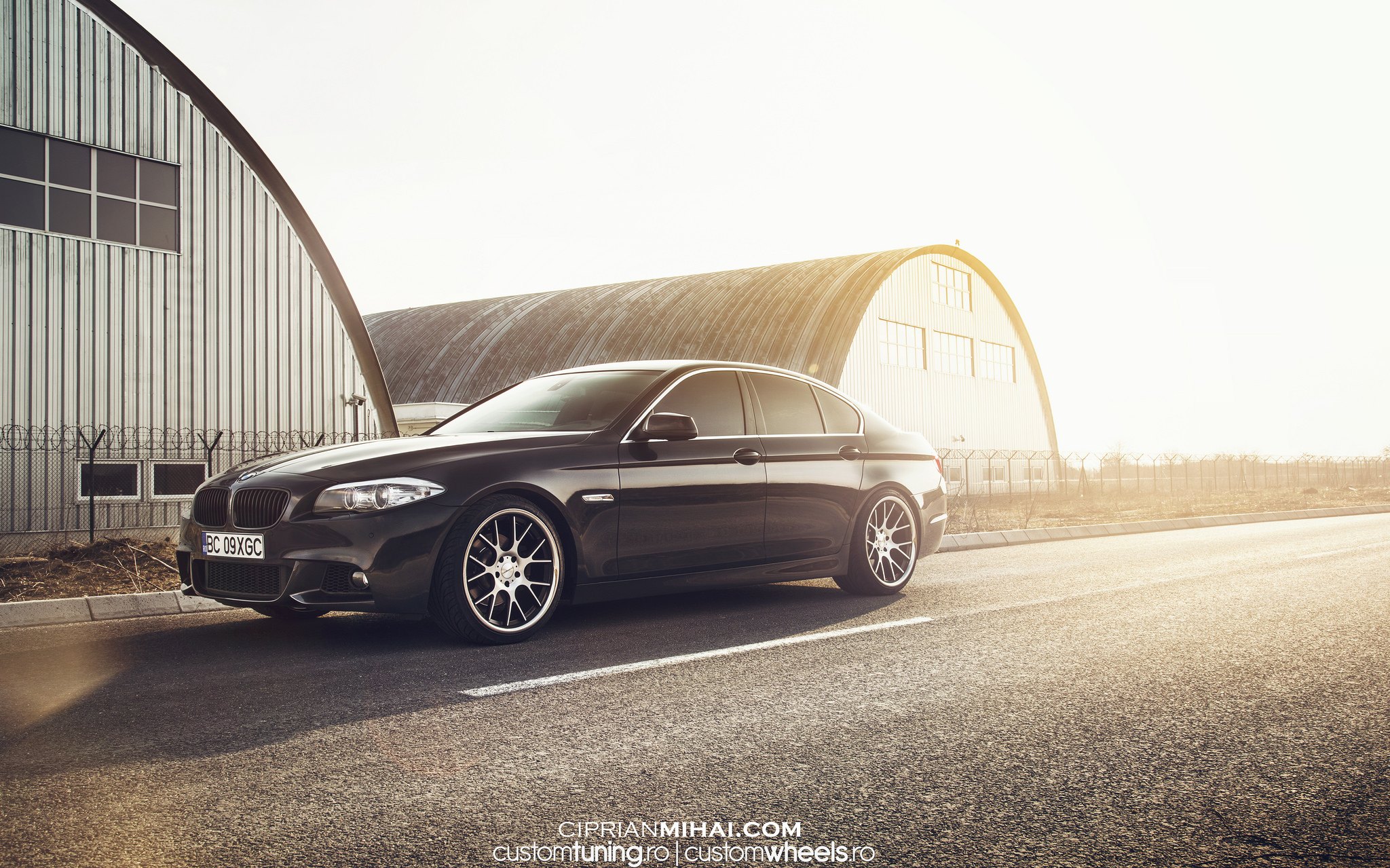 Black BMW 5-Series with Crystal Clear Headlights  - Photo by Ciprian Mihai