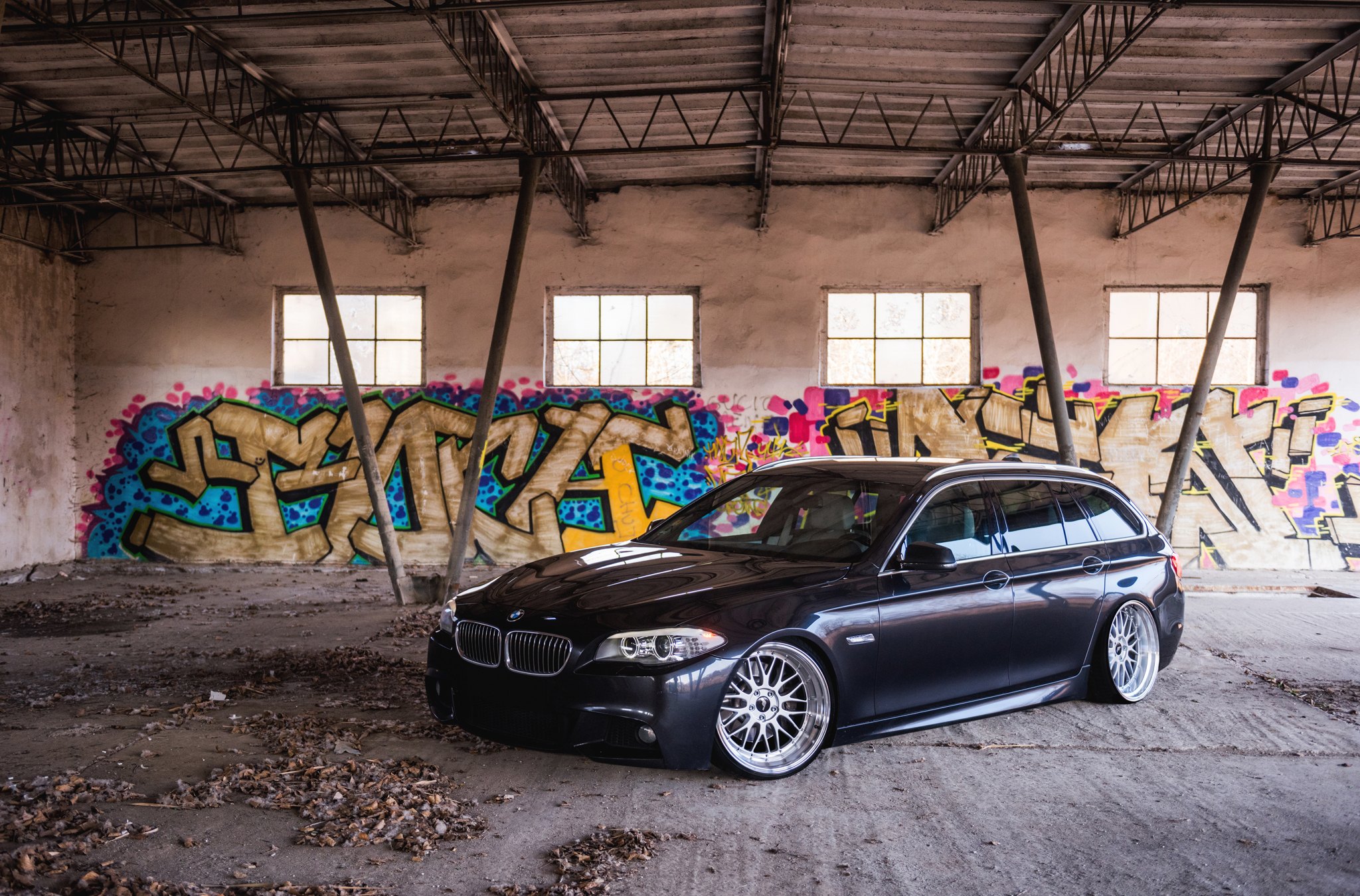 Aftermarket Projector Headlights on Black BMW 5-Series - Photo by JR Wheels