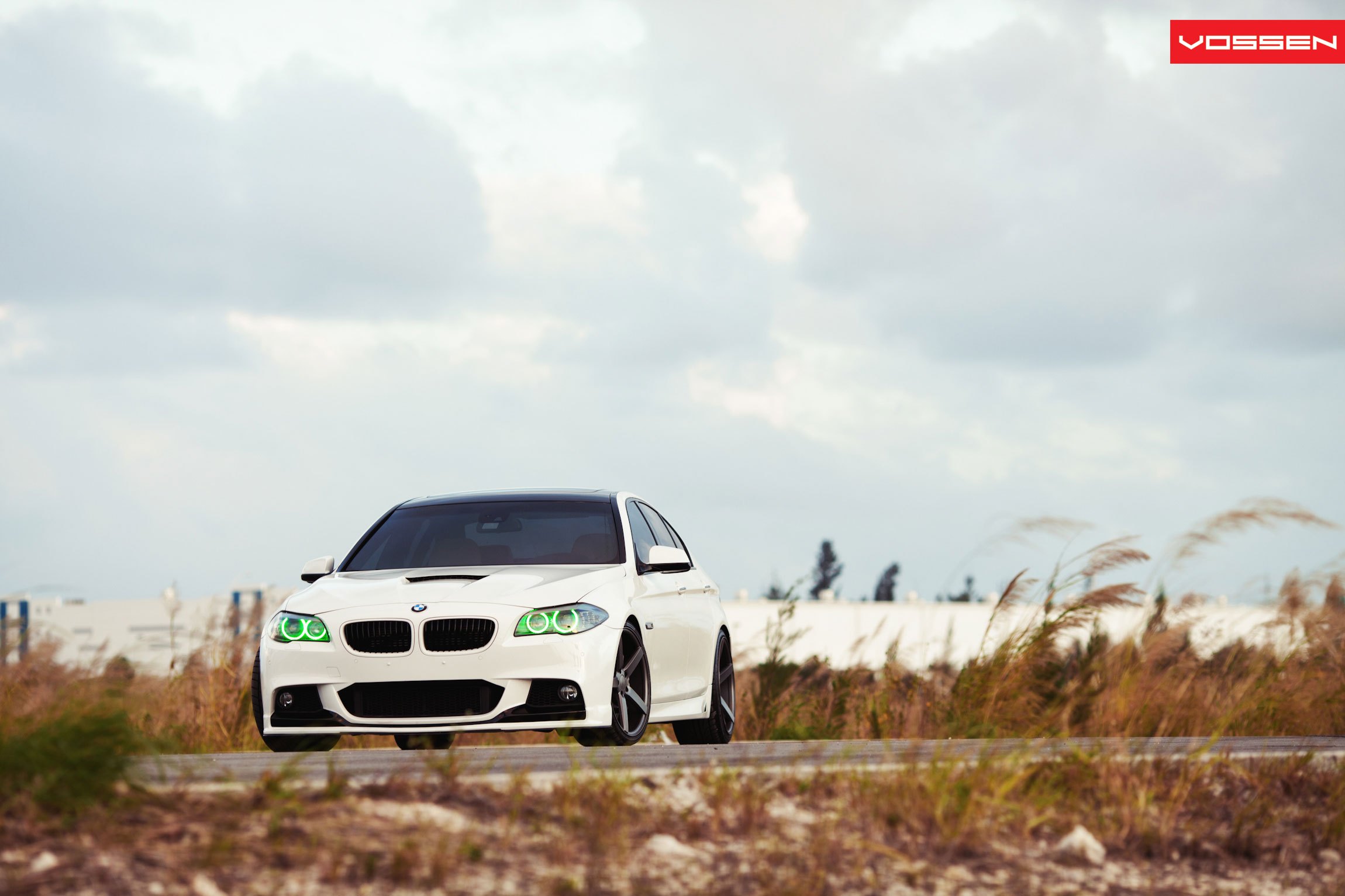 White BMW 5-Series with Color Shift Headlights - Photo by Vossen