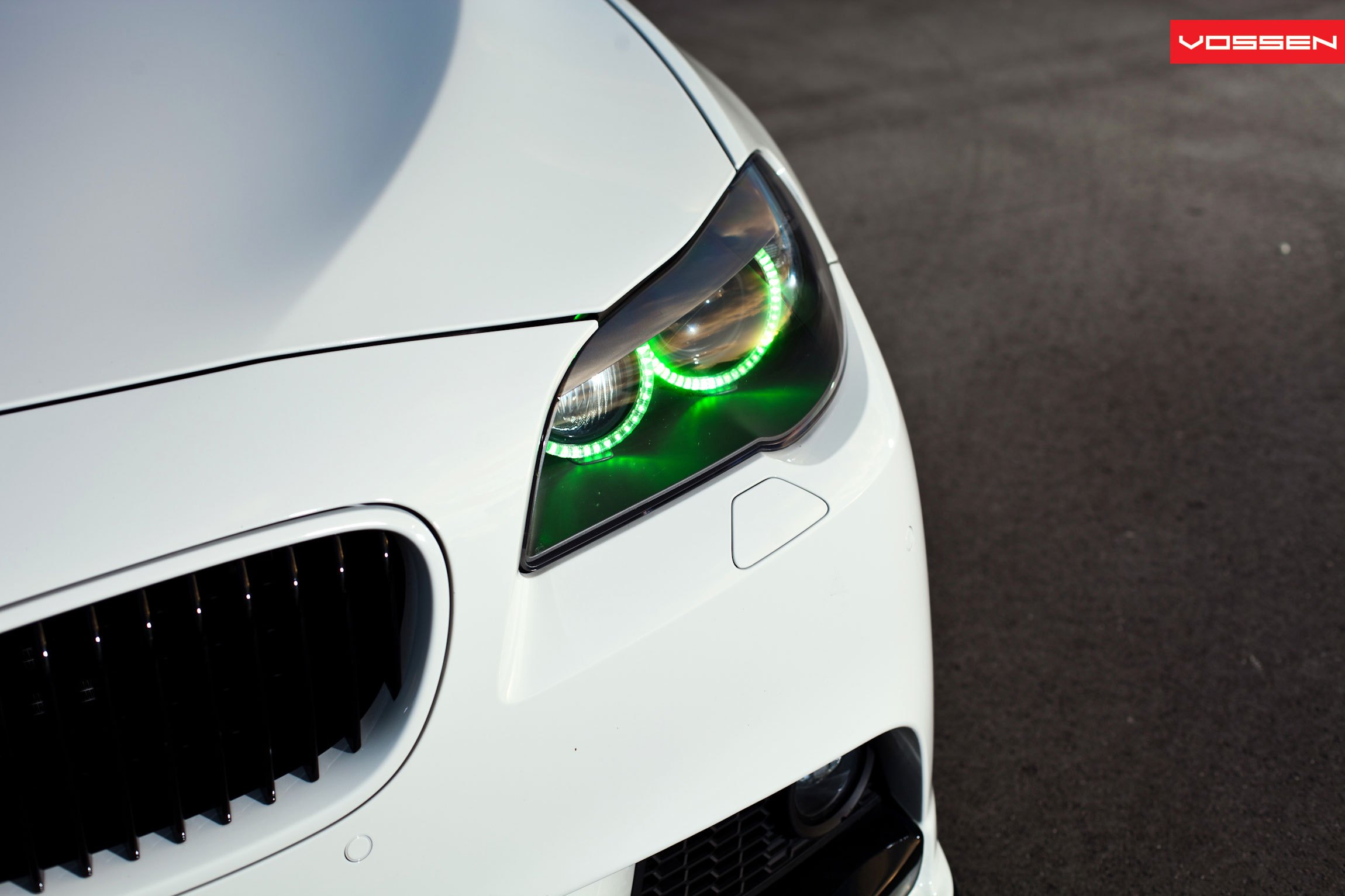 Color Shift Halo Headlights on White BMW 5-Series - Photo by Vossen