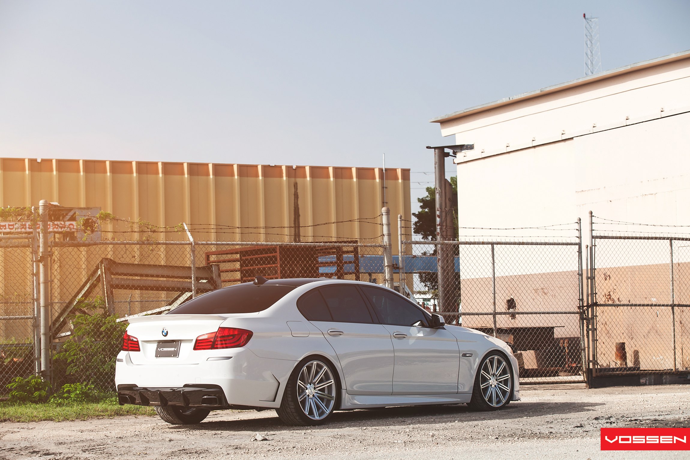 White BMW 5-Series with Aftermarket Red Taillights - Photo by Vossen