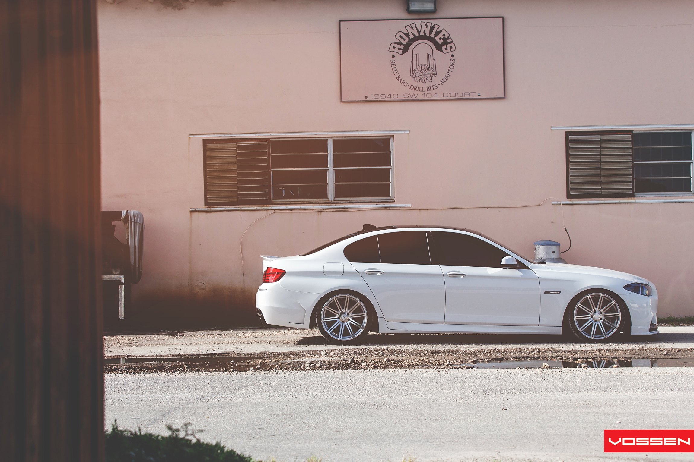White BMW 5-Series Side Skirts - Photo by Vossen