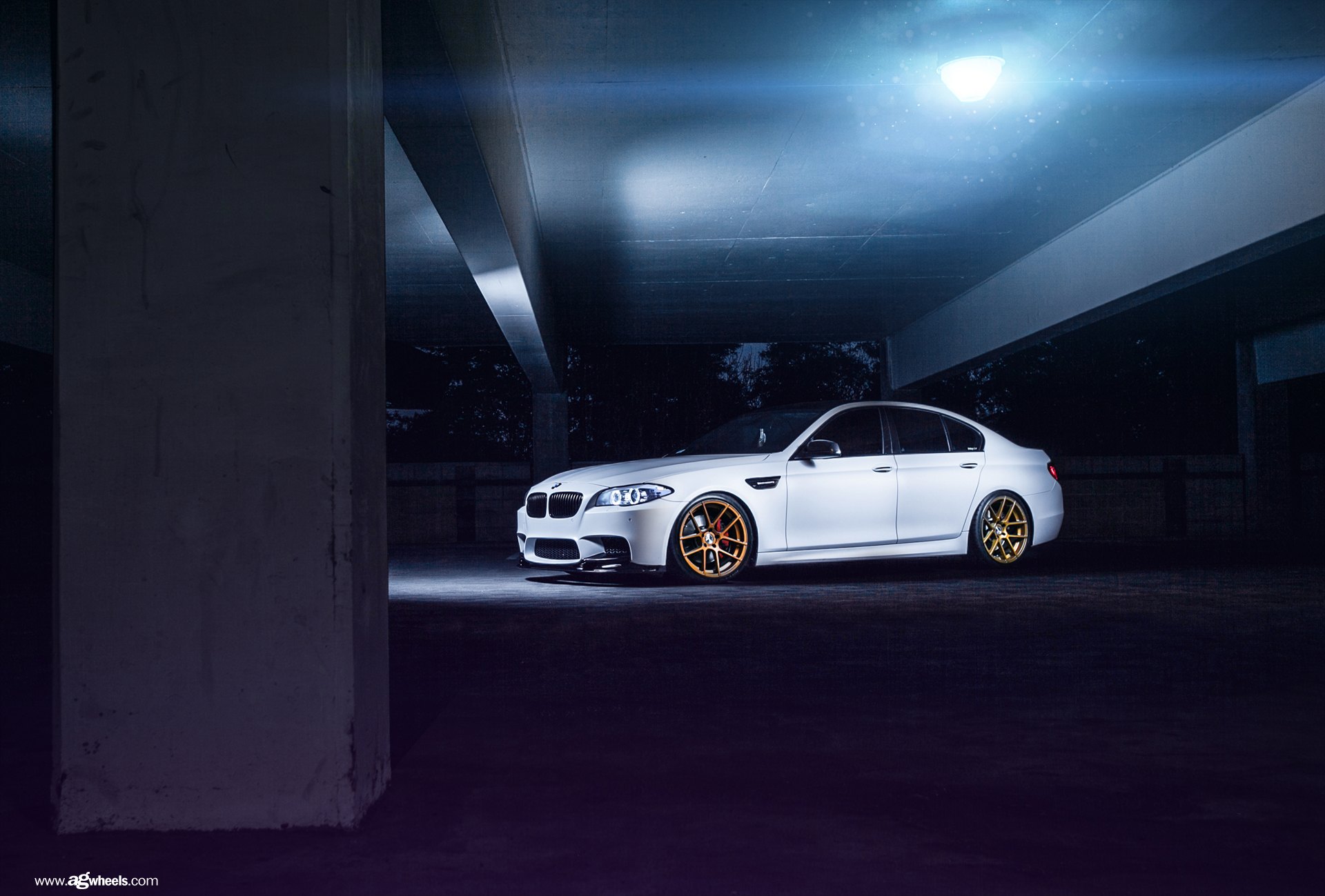 White BMW 5-Series with Aftermarket Side Skirts - Photo by Avant Garde Wheels