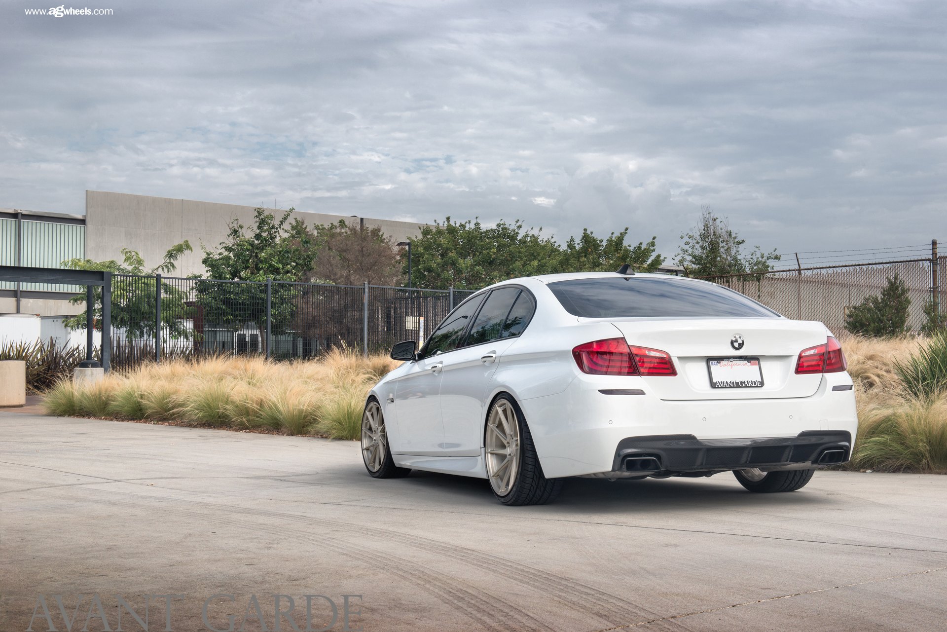 White BMW 5-Series with Custom Red Taillights - Photo by Avant Garde Wheels