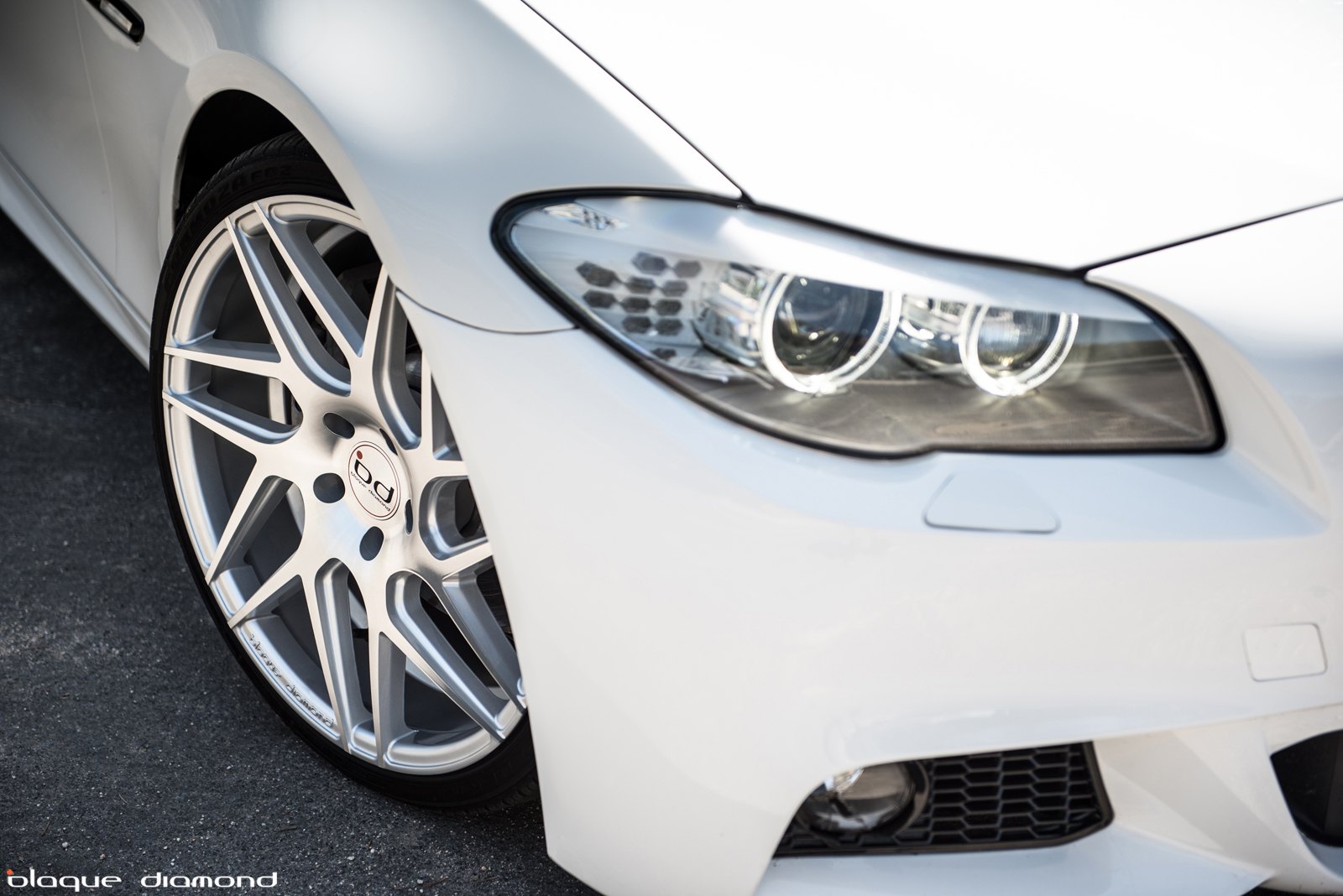 White BMW 5-Series with Aftermarket Front Bumper - Photo by Blaque Diamond