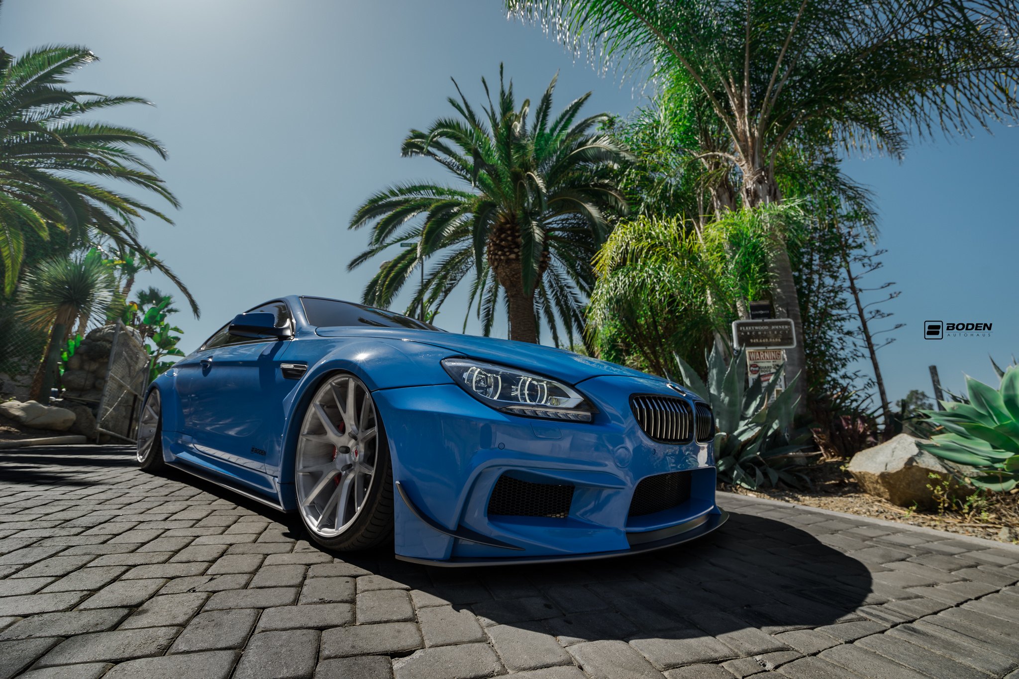 Blue BMW 6-Series with Aftermarket Front Bumper - Photo by Boden Autohaus