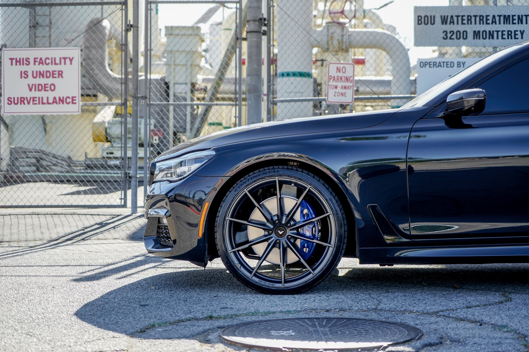 Continental Tires on Custom Black BMW 7-Series - Photo by VIBE Motorsports