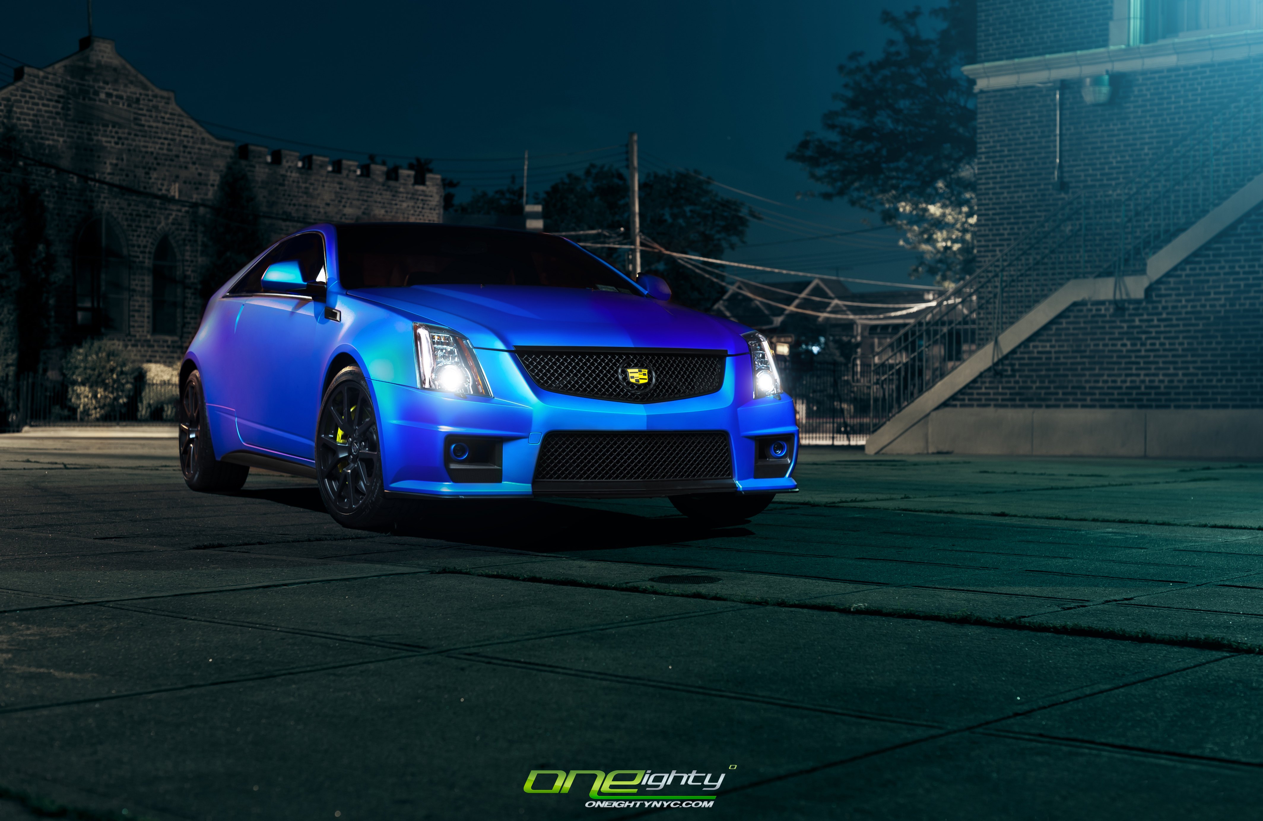 Blacked Out Mesh Grille on Blue Cadillac CTS - Photo by ONEighty NYC