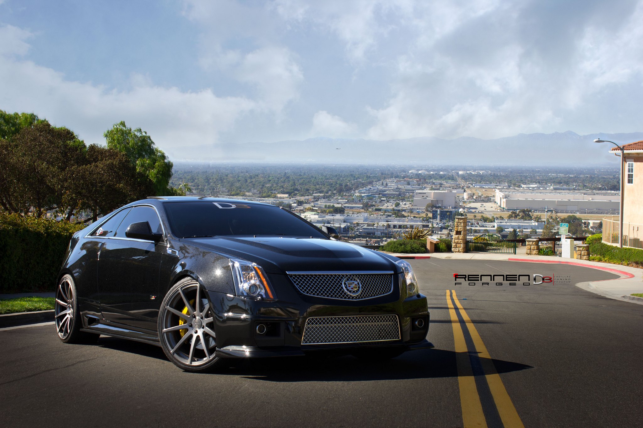 Gray Cadillac CTS with Aftermarket Headlights - Photo by Rennen International