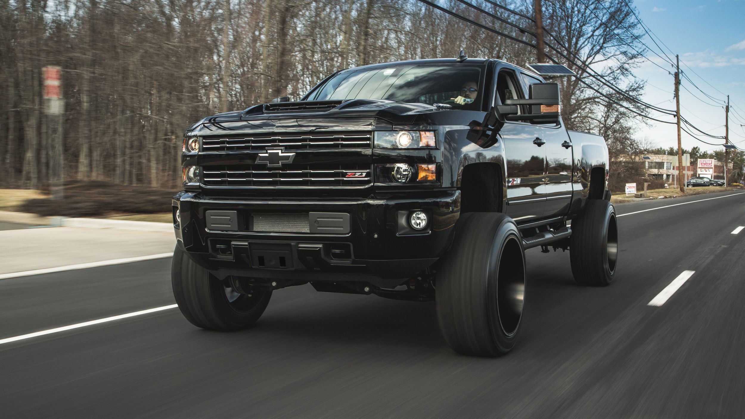 Aftermarket Side Mirrors on Black Lifted Chevy Silverado - Photo by CARiD