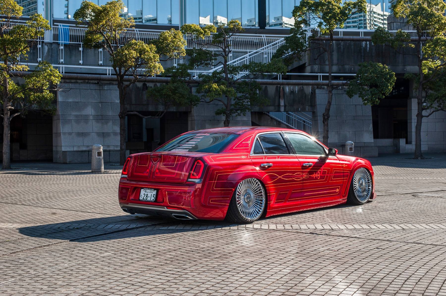 Aftermarket Rear Diffuser on Red Lowered Chrysler 300 - Photo by Lexani