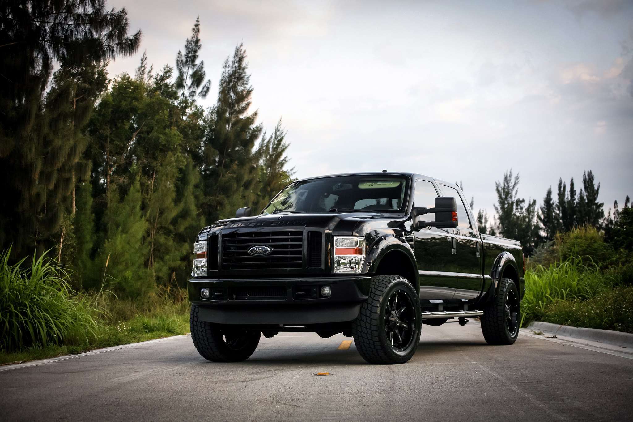 Black Lifted Ford F-250 with Aftermarket Front Bumper - Photo by Fuel Offroad
