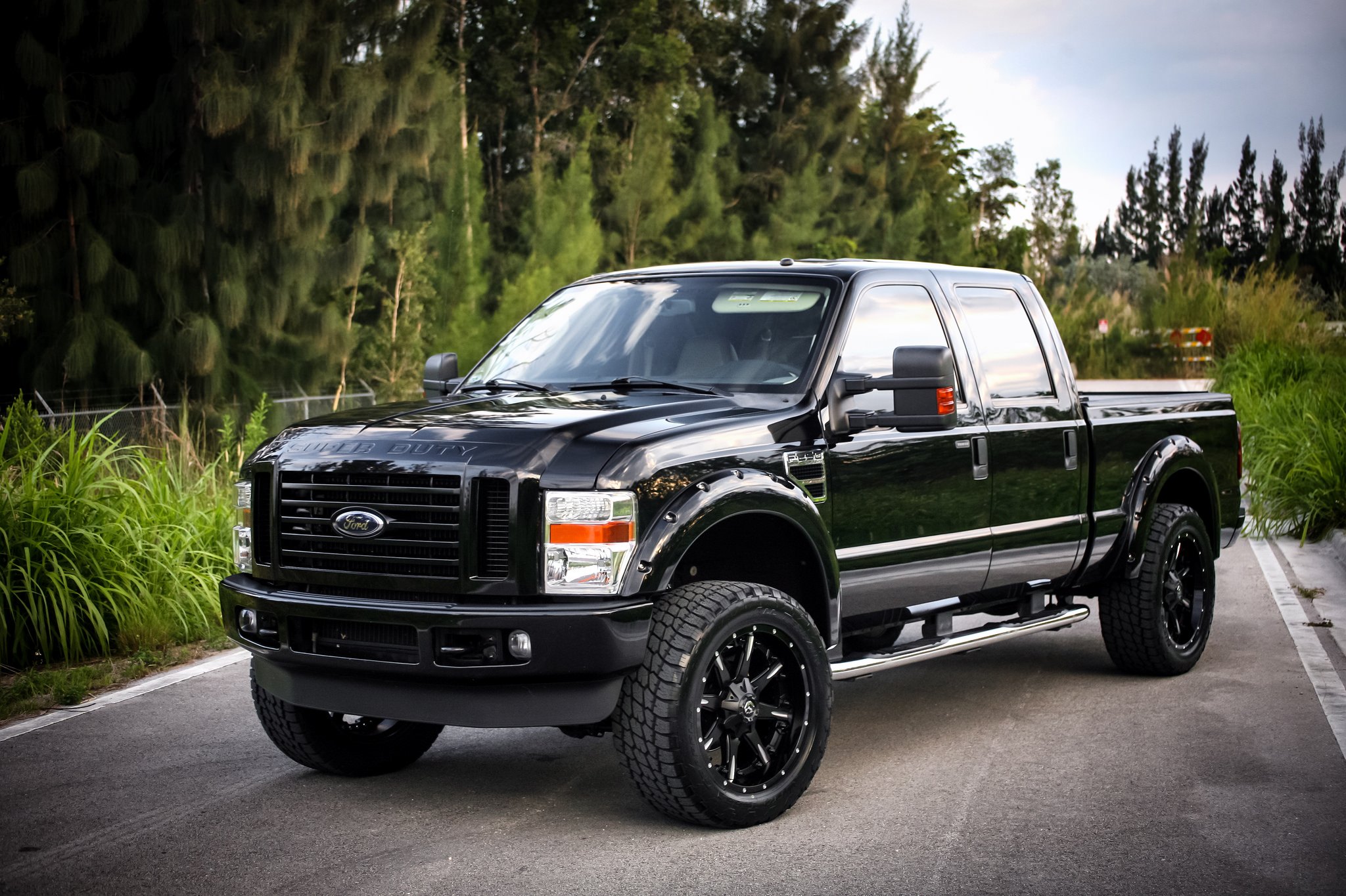 Black Ford F-250 Polished Side Steps - Photo by Fuel Offroad