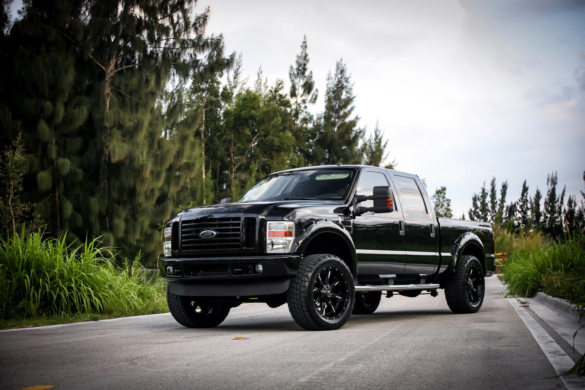 Custom Tow Side Mirrors on Black Ford F-250 - Photo by Fuel Offroad