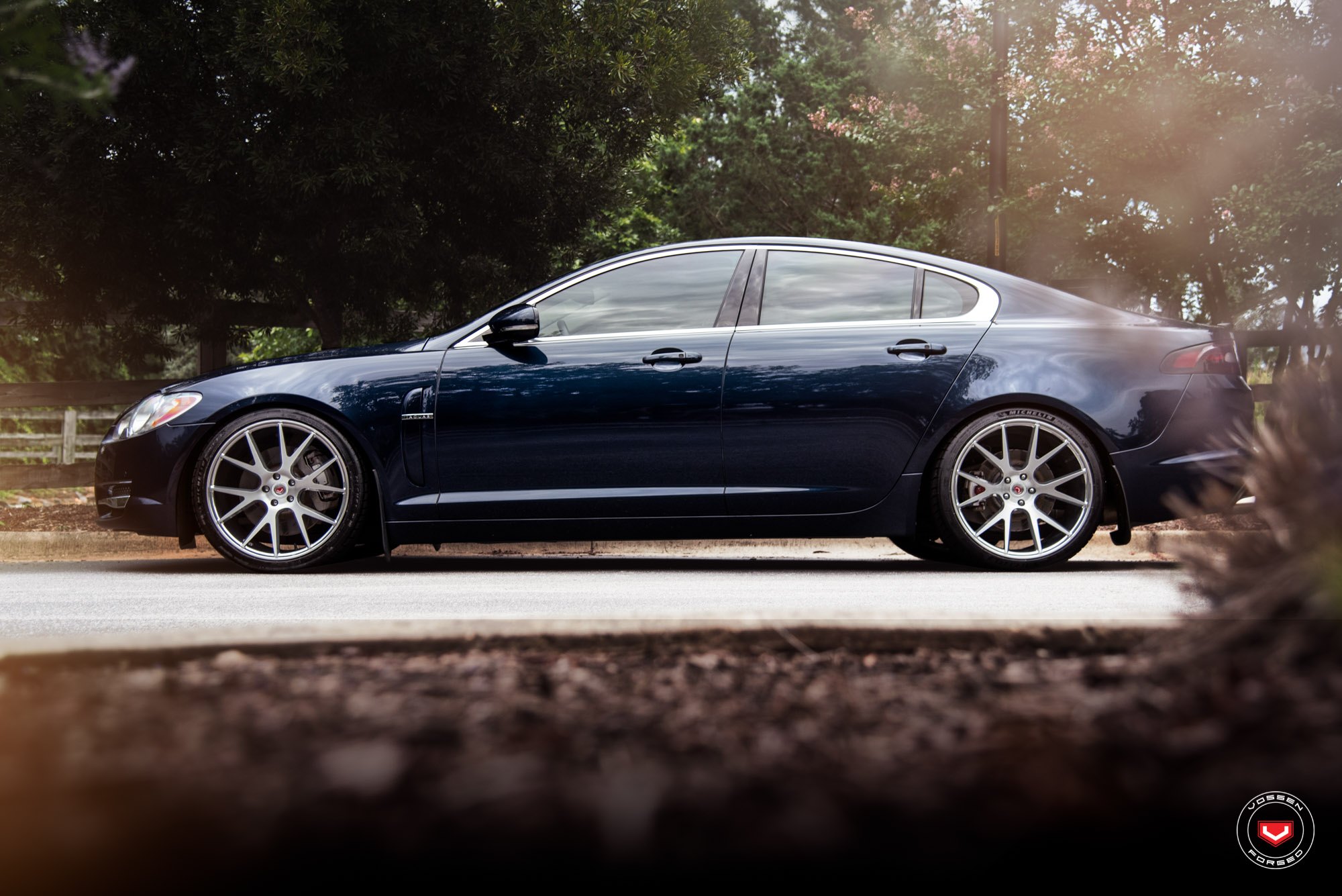 Custom Dark Blue Jaguar XF on Michelin Tires - Photo by Vossen