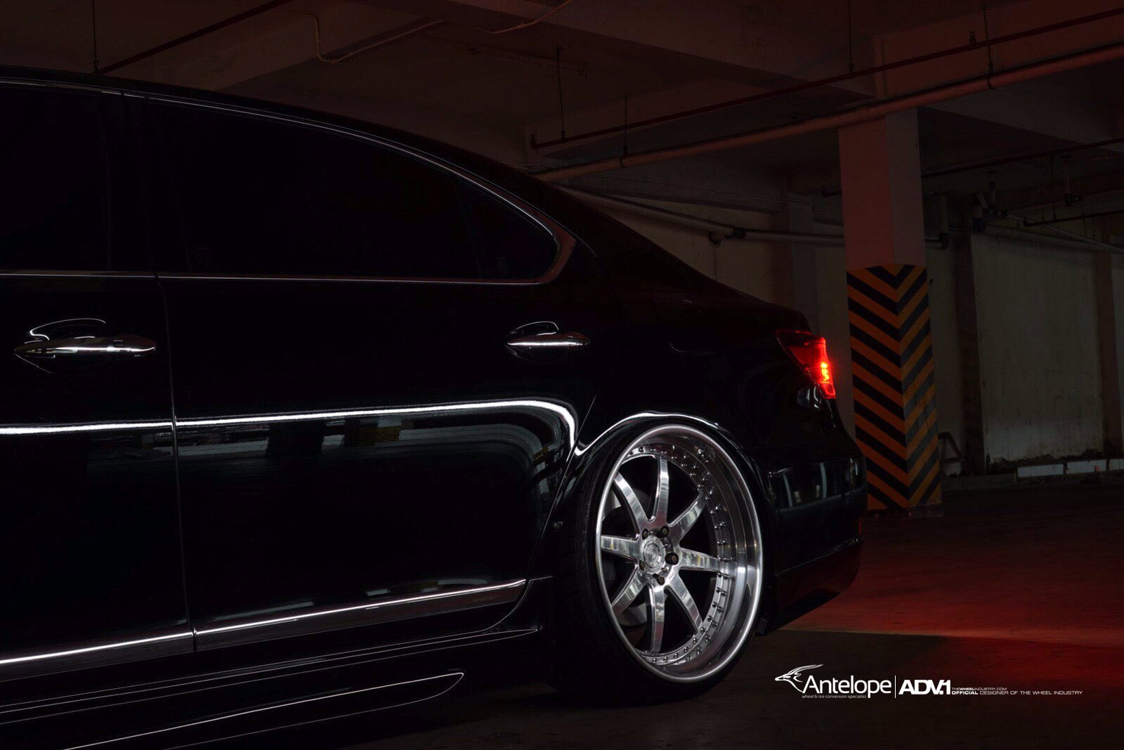 Aftermarket Side Skirts on Black Lexus LS - Photo by ADV.1