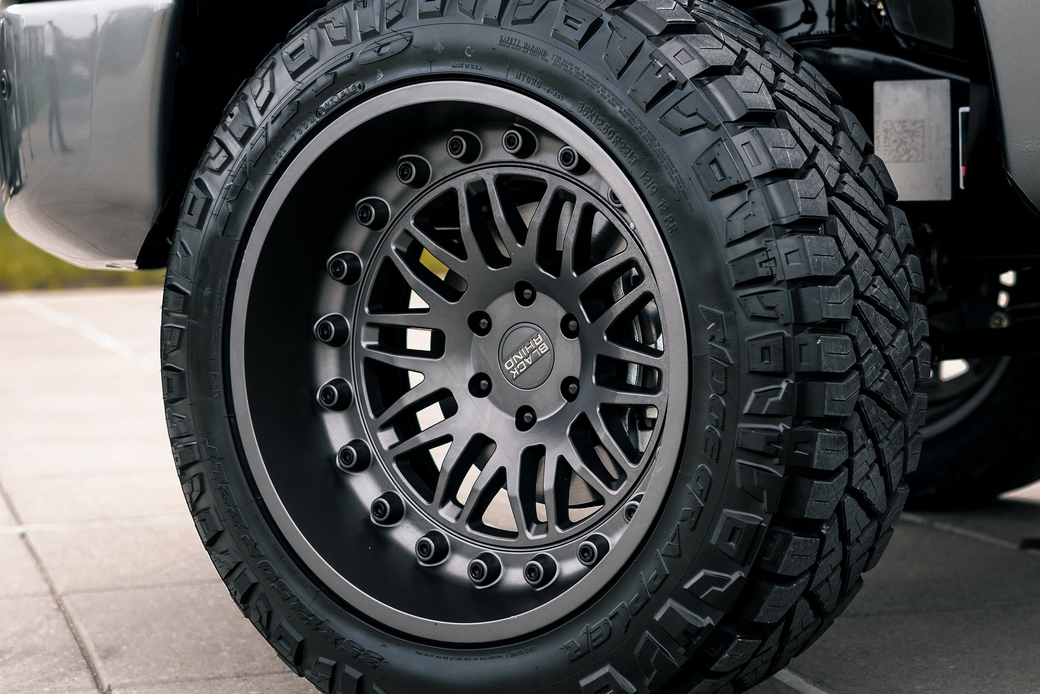 Nitto Ridge Grapper Tires on Silver Nissan Titan - Photo by Black Rhino Wheels