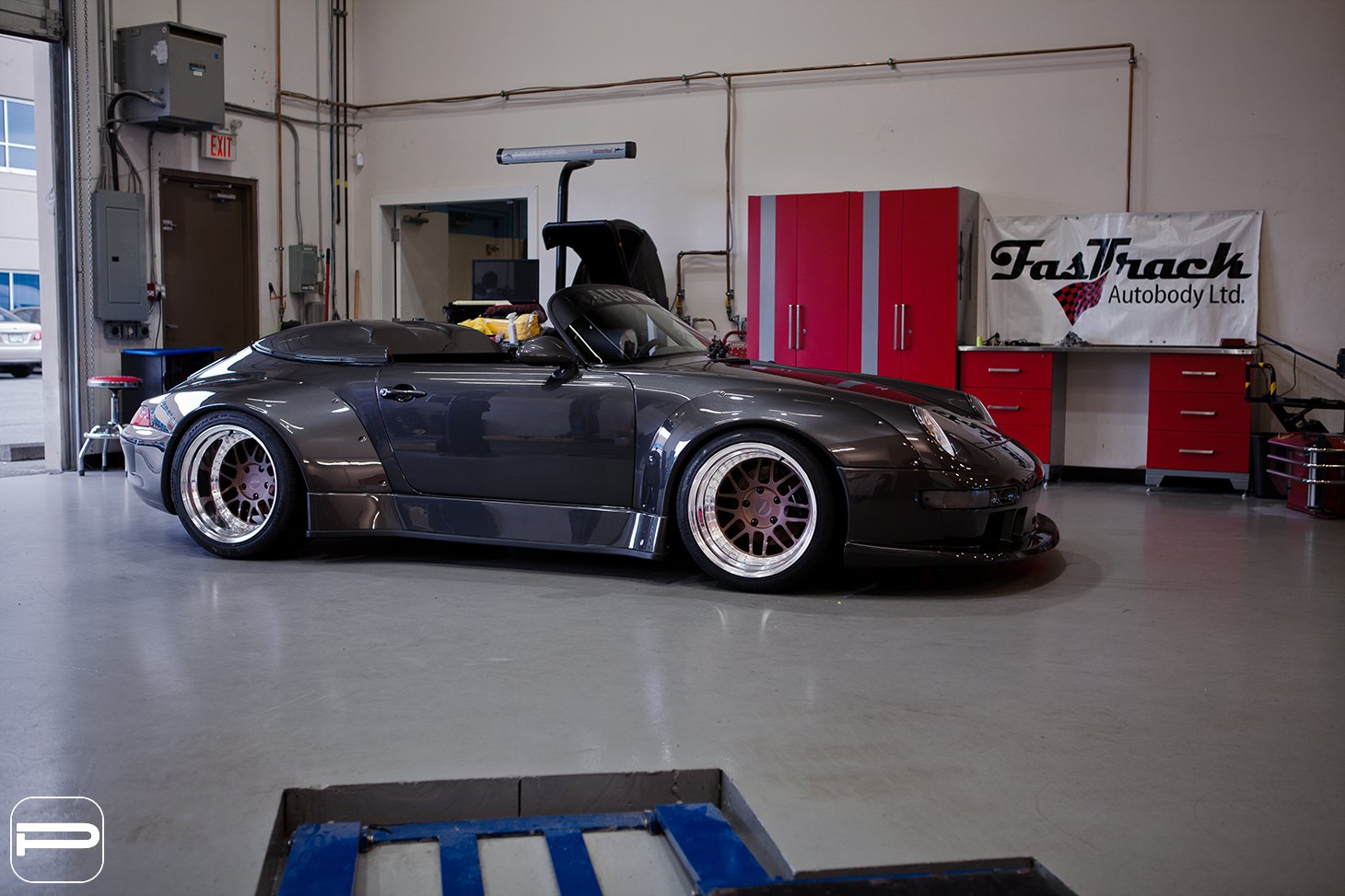 Black Convertible Porsche 911 with Custom Side Skirts - Photo by PUR Wheels