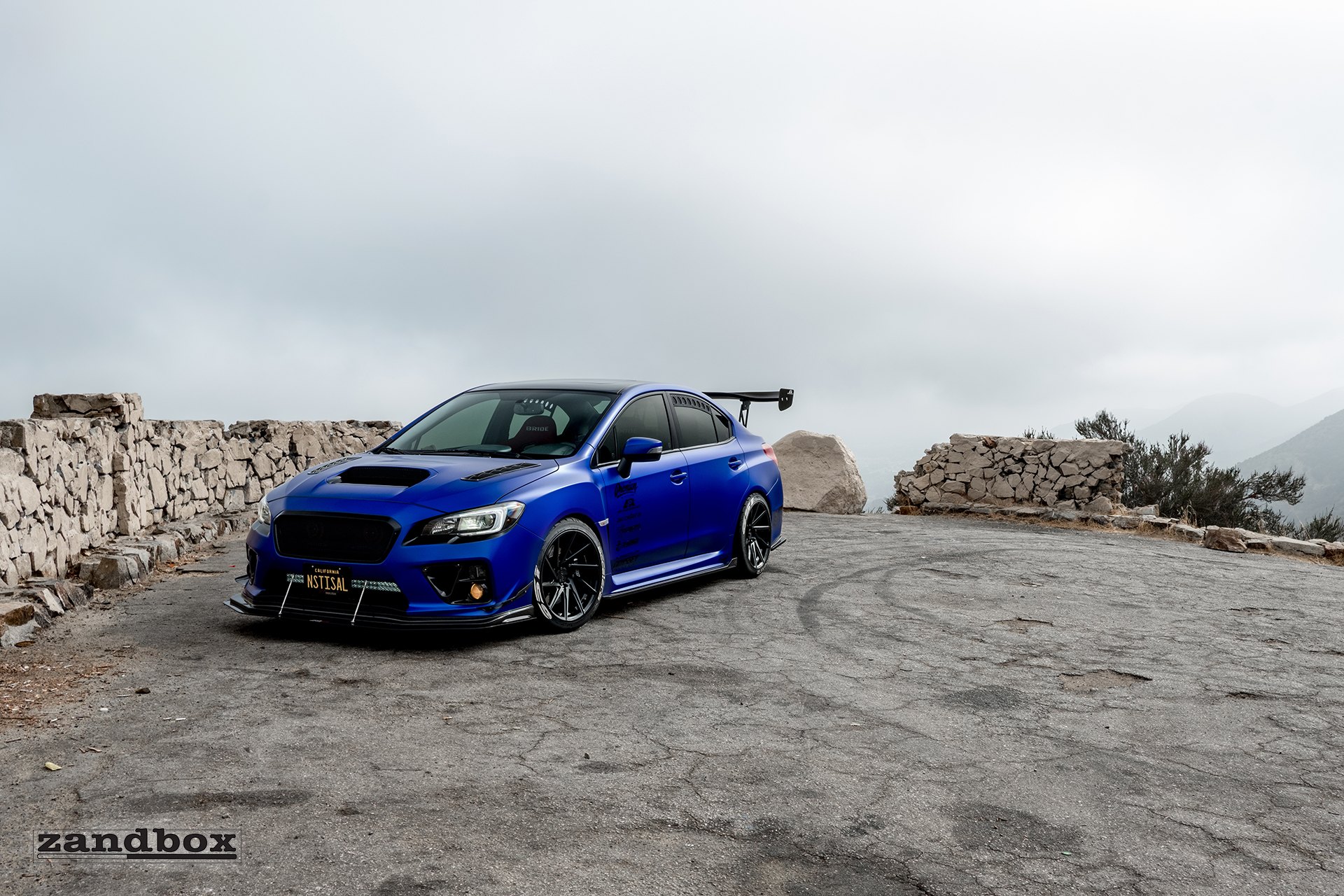 Blue Subaru WRX with Custom Headlights  - Photo by zandbox