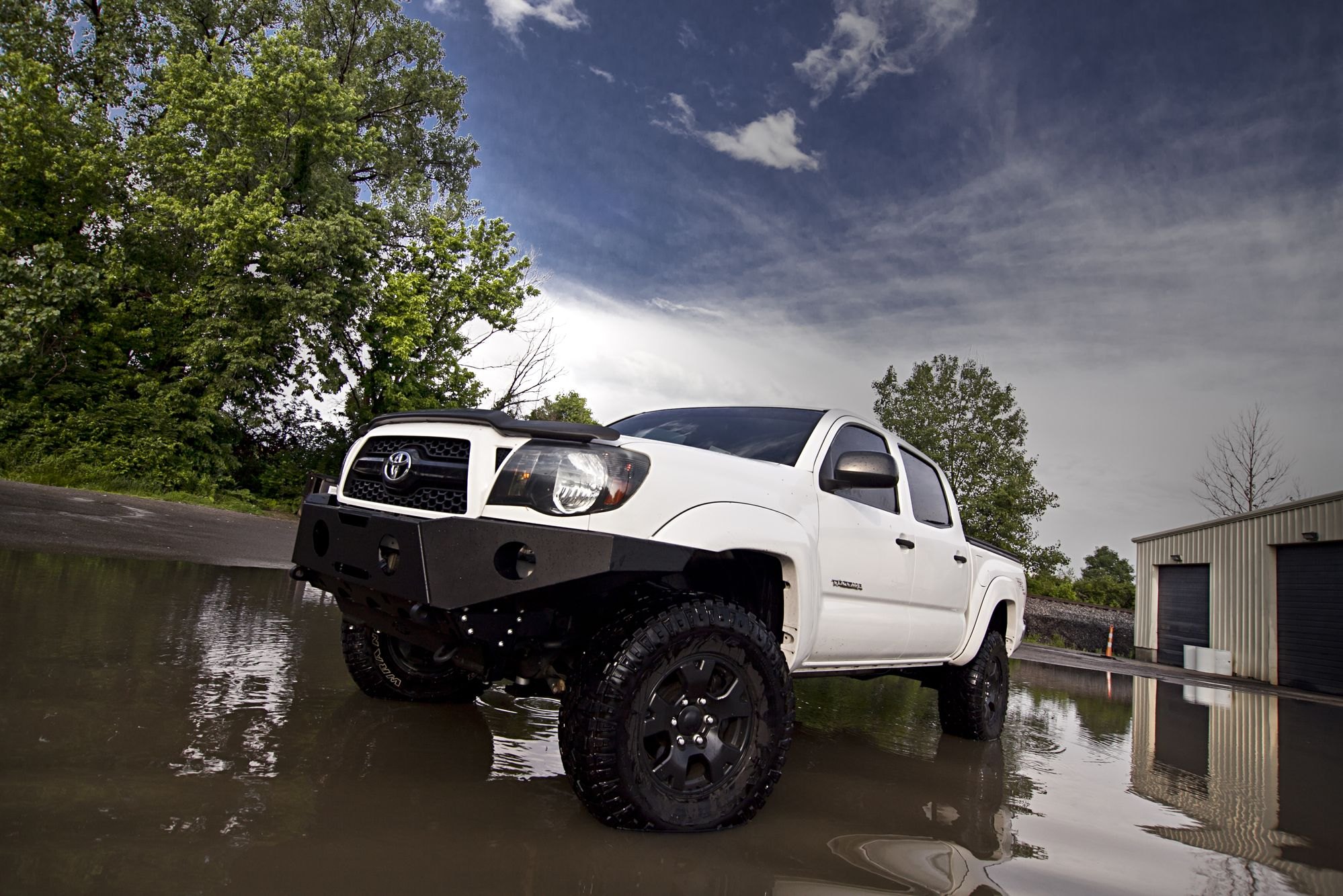 White Toyota Tacoma with Off-Road Front Bumper - Photo by dan kinzie