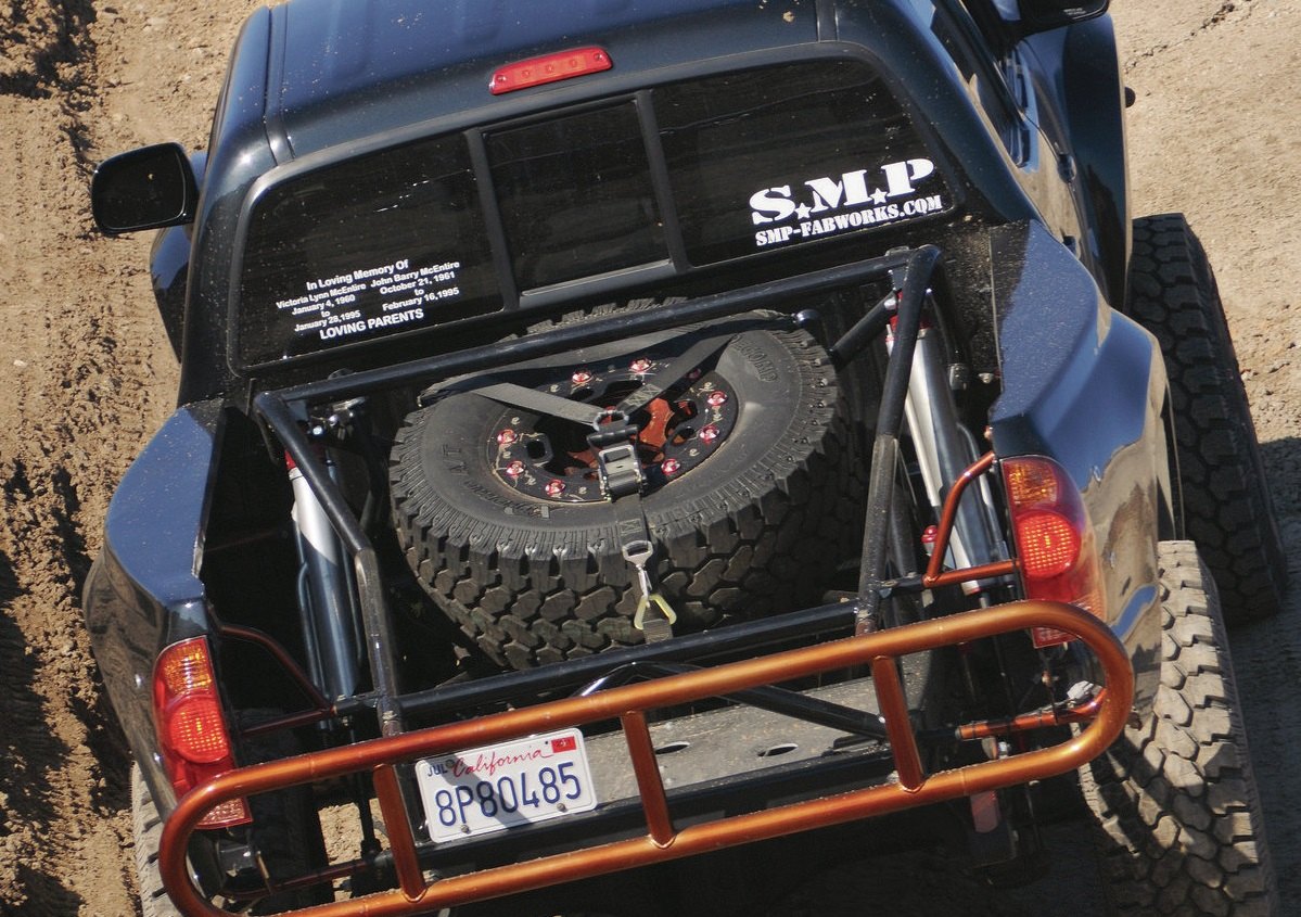 Trunk Spare Tire Kit in Black Lifted Toyota Tacoma - Photo by Jerrod Jones