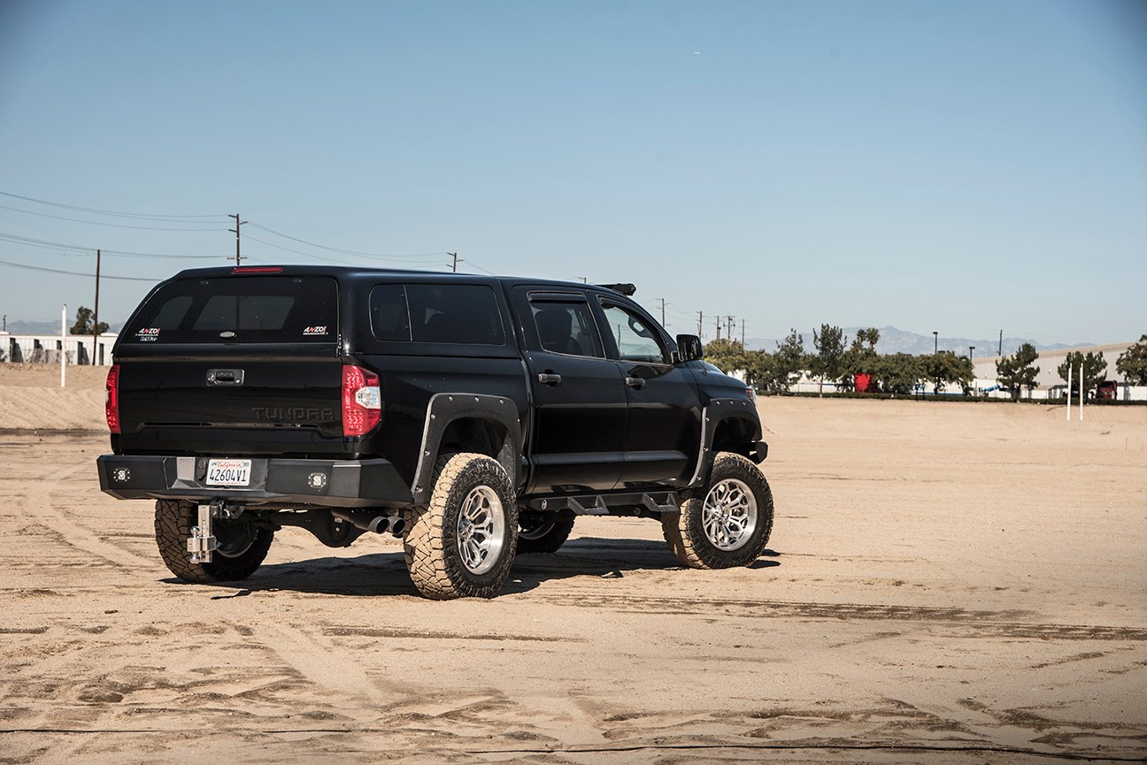 Lifted Tundra With Bushwacker Fender Flares on Grid Off-road Wheels - Photo by Grid Off-road