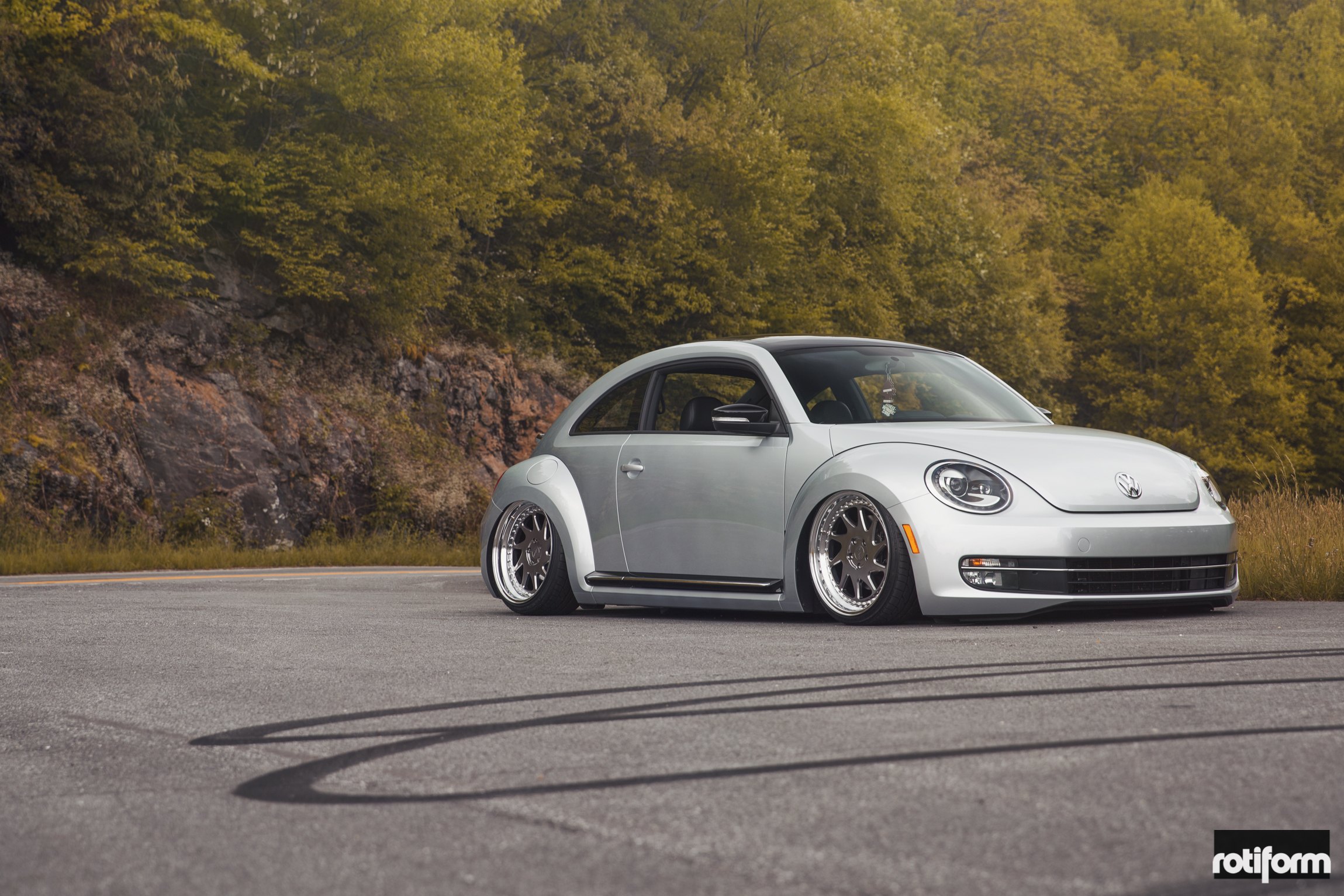 Silver Stanced VW Beetle with Aftermarket Front Bumper - Photo by Rotiform