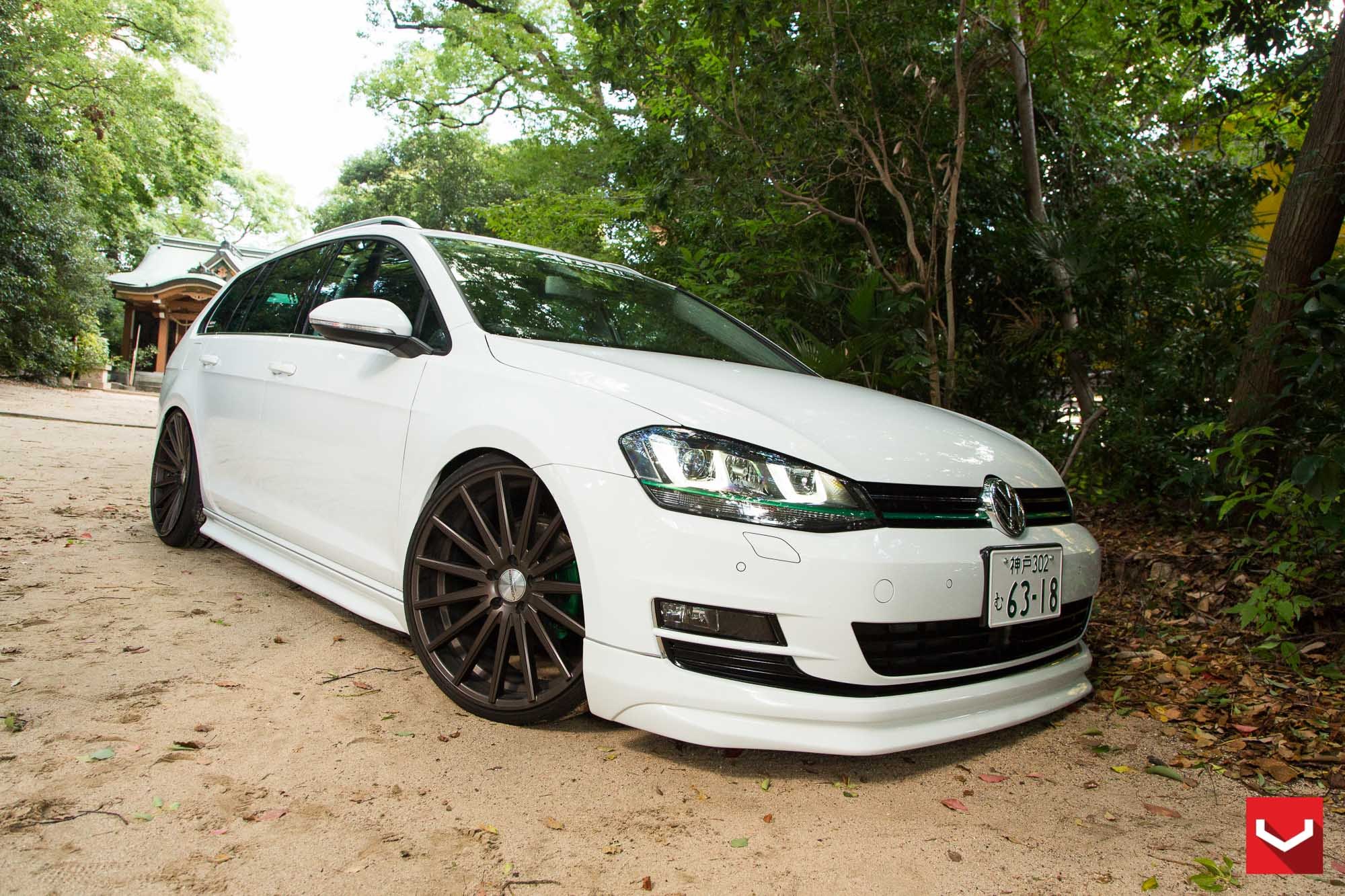 White Stanced VW Golf with Custom Front Bumper - Photo by Vossen