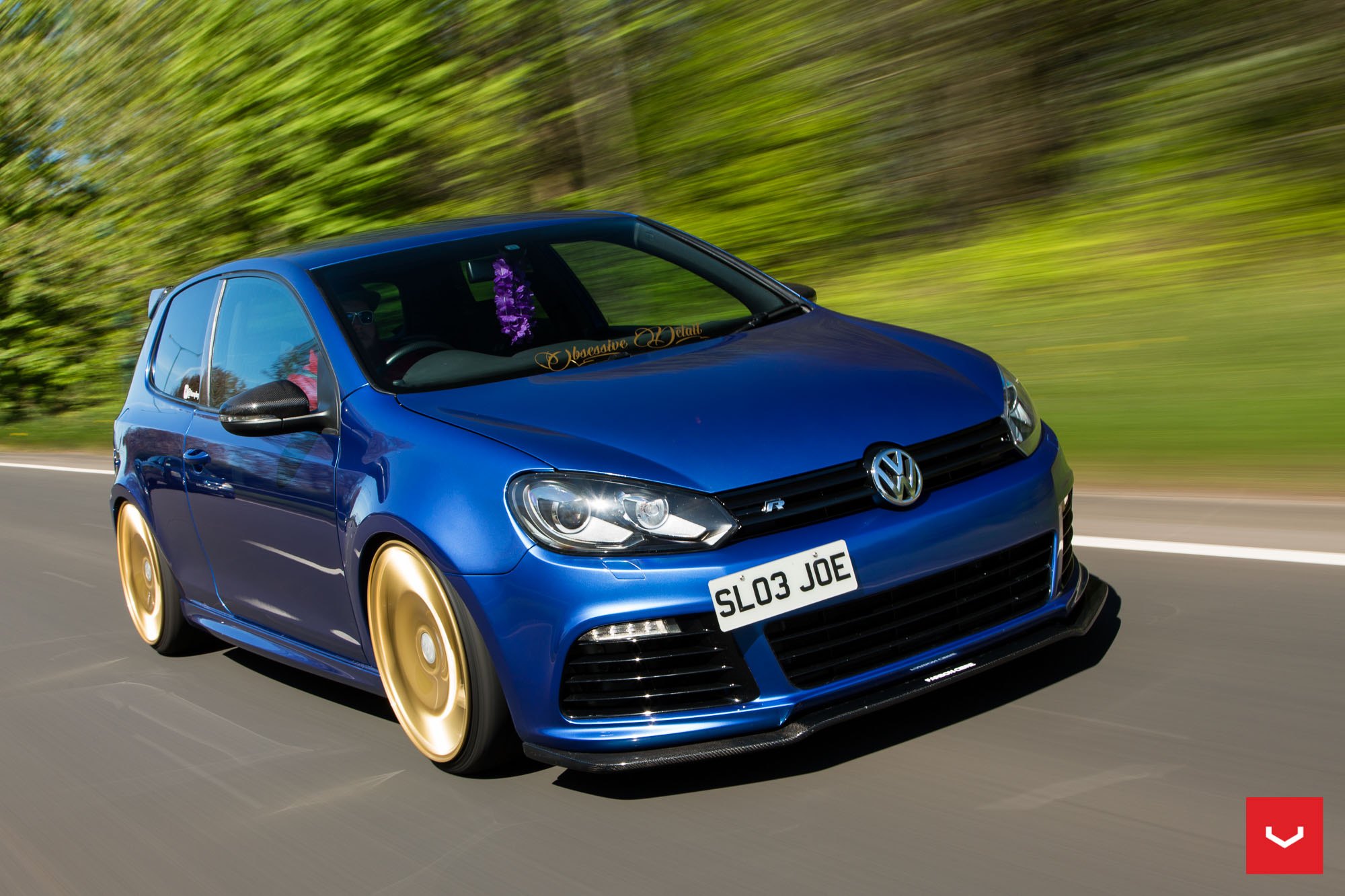 Blue VW Golf with Carbon Fiber Front Lip - Photo by Vossen