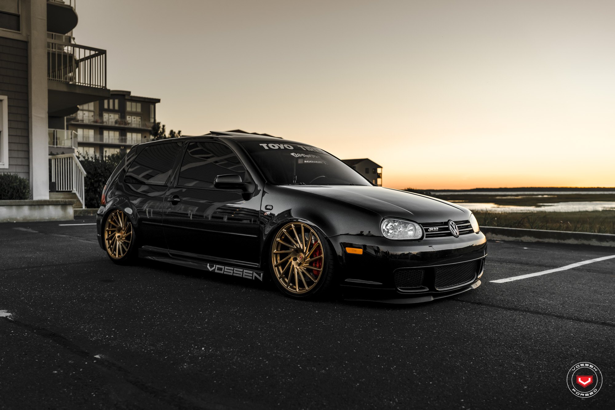 Black VW Golf GTI with Crystal Clear Headlights - Photo by Vossen