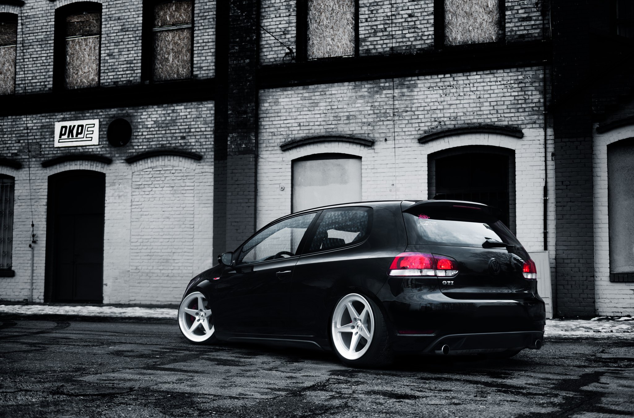 Black VW Golf with Red Clear LED Taillights - Photo by JR Wheels