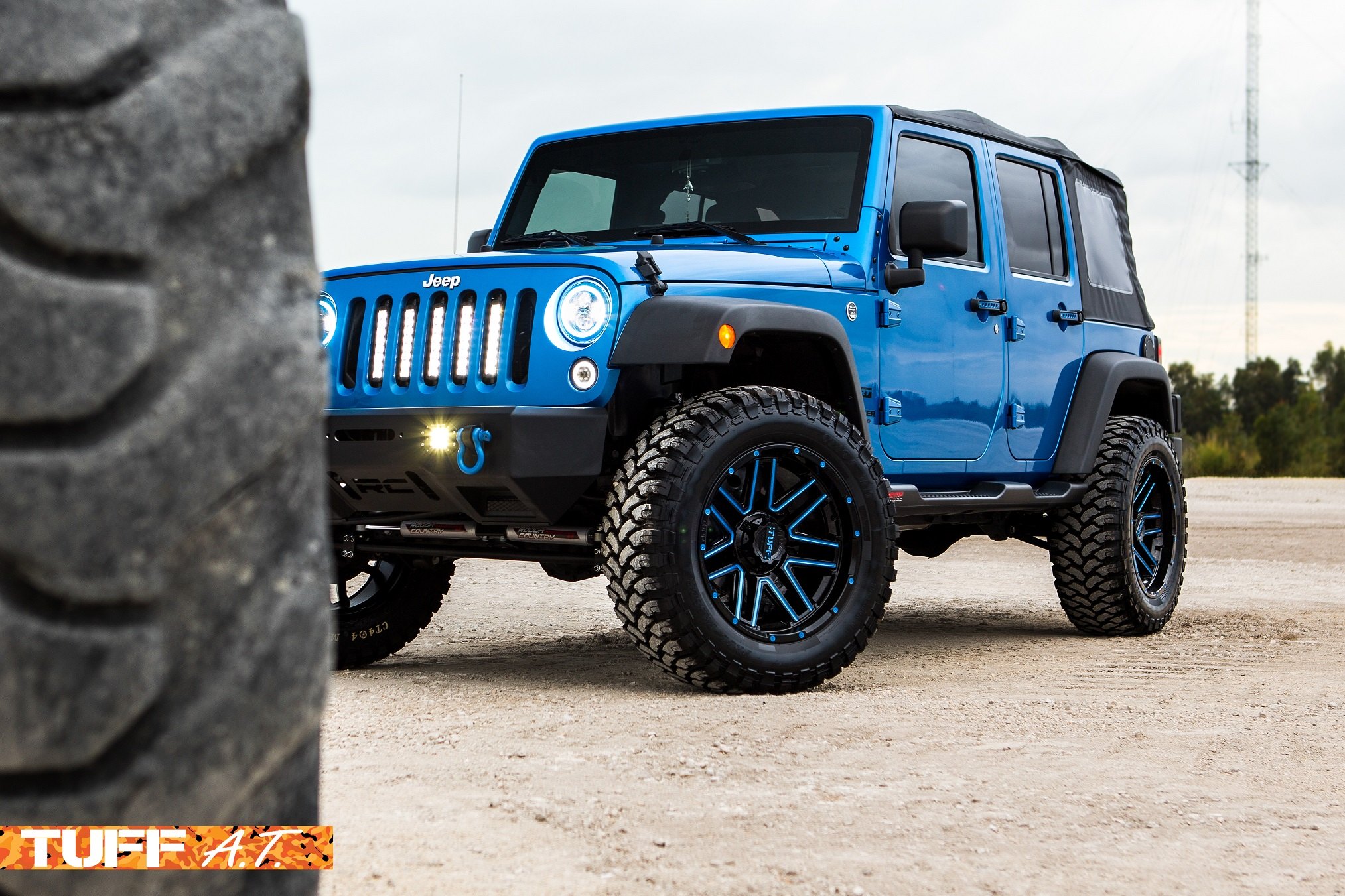 JK Wrangler lifted on 20» off-road rims - Photo by Tuff