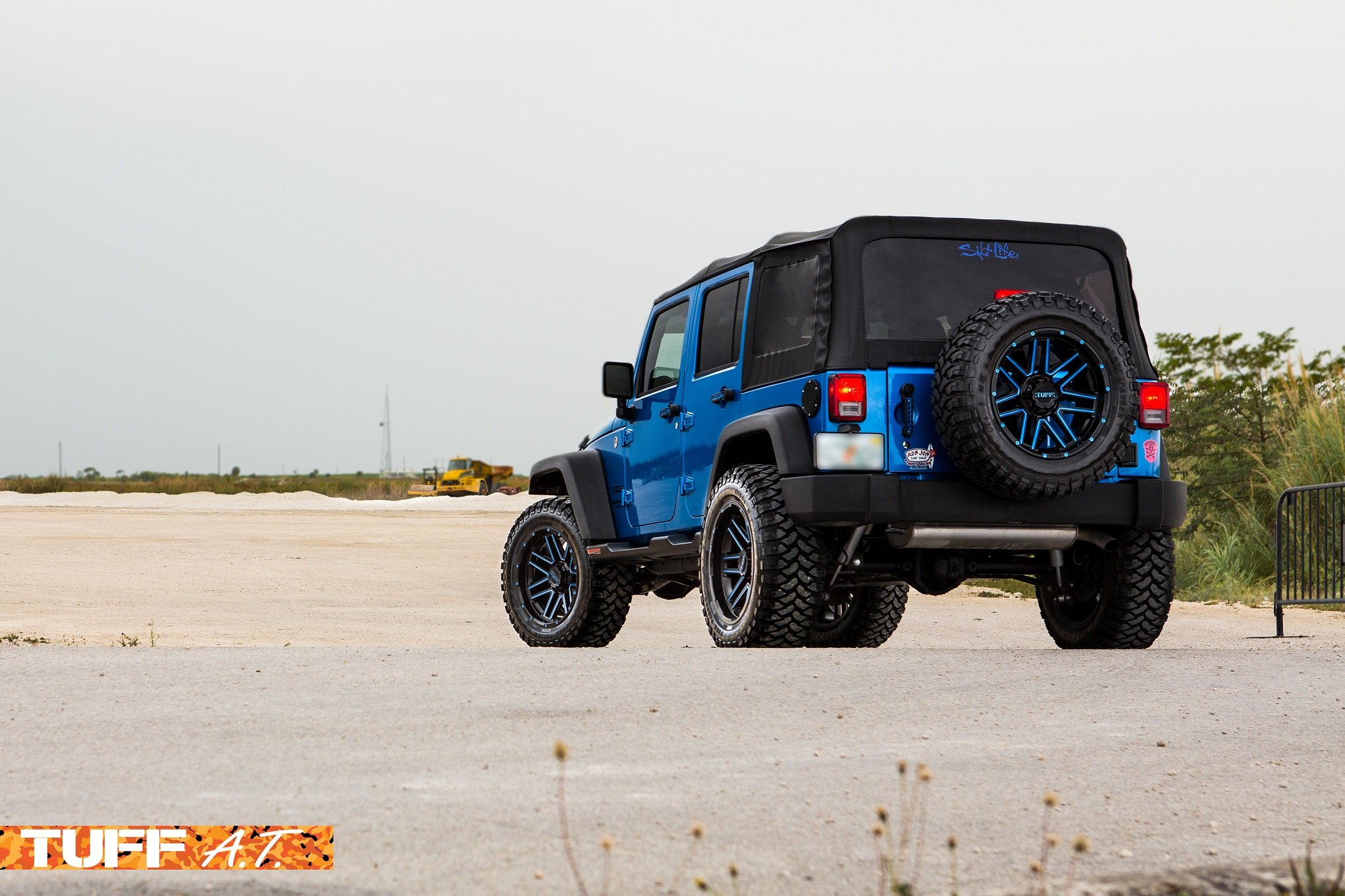 Jeep Wrangler JK lifted on 35 inch mud tires - Photo by Tuff