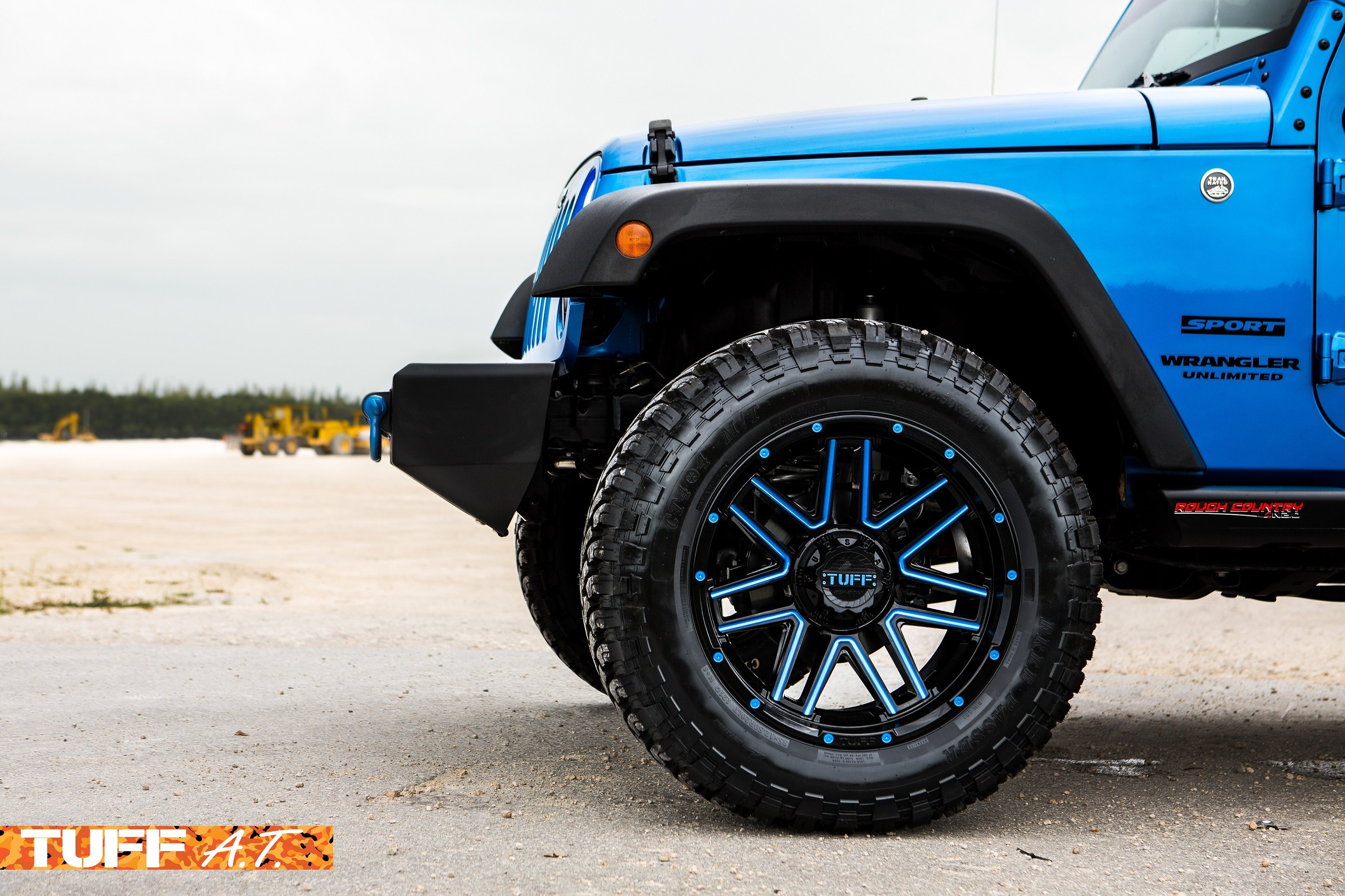 TUFF T17 Black 20» rims with blue custom painted accents - Photo by Tuff