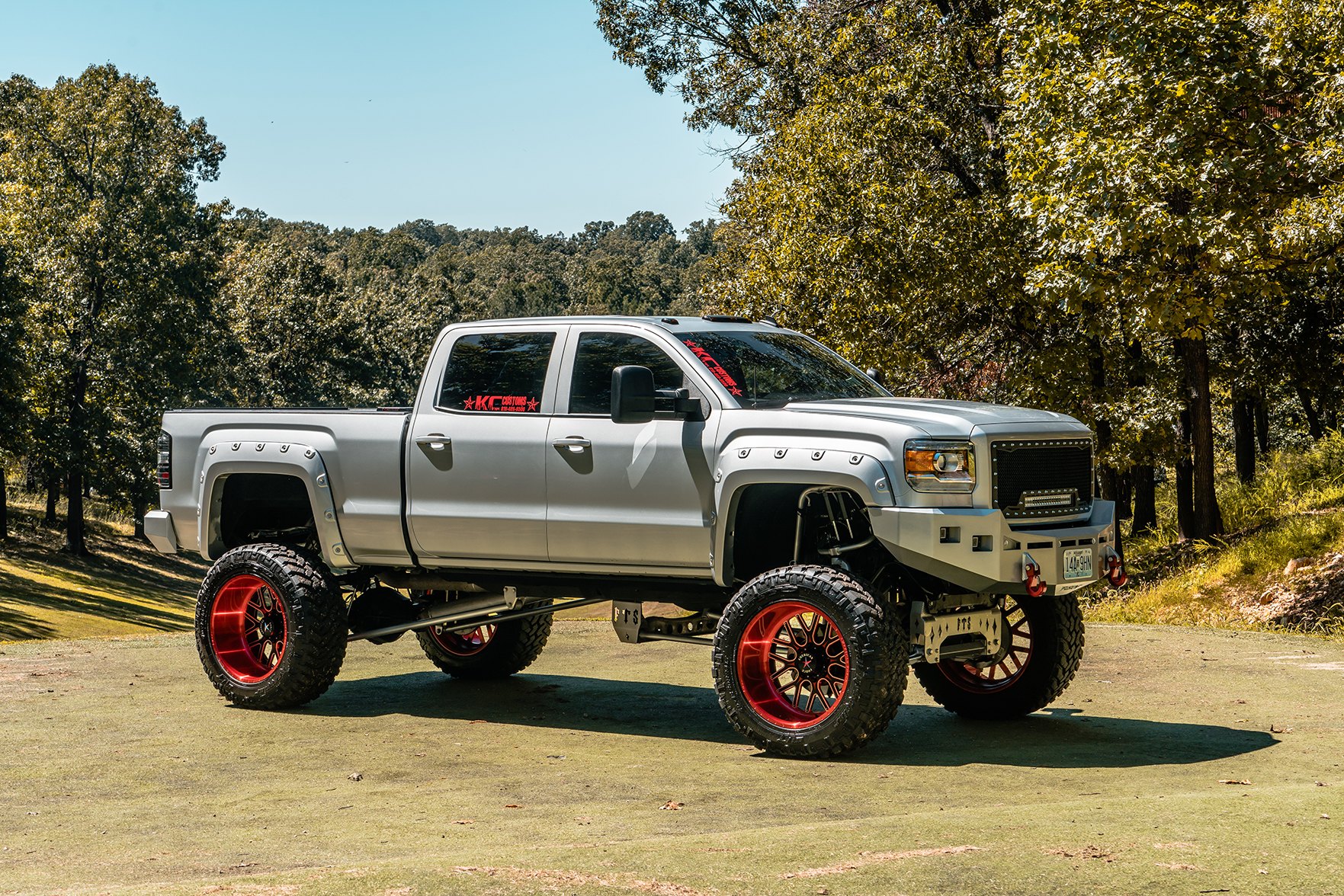 GMC Sierra truck on 40» mud tires - Photo by American Force