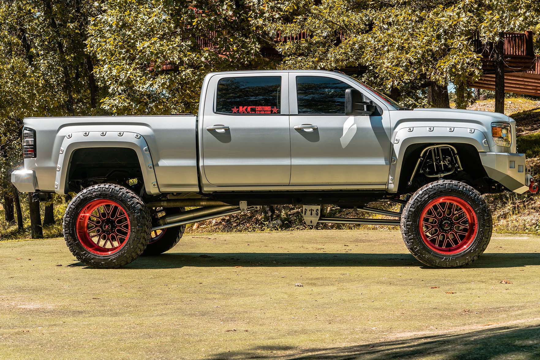 Sierra with colormatched cut-out fender flares - Photo by American Force