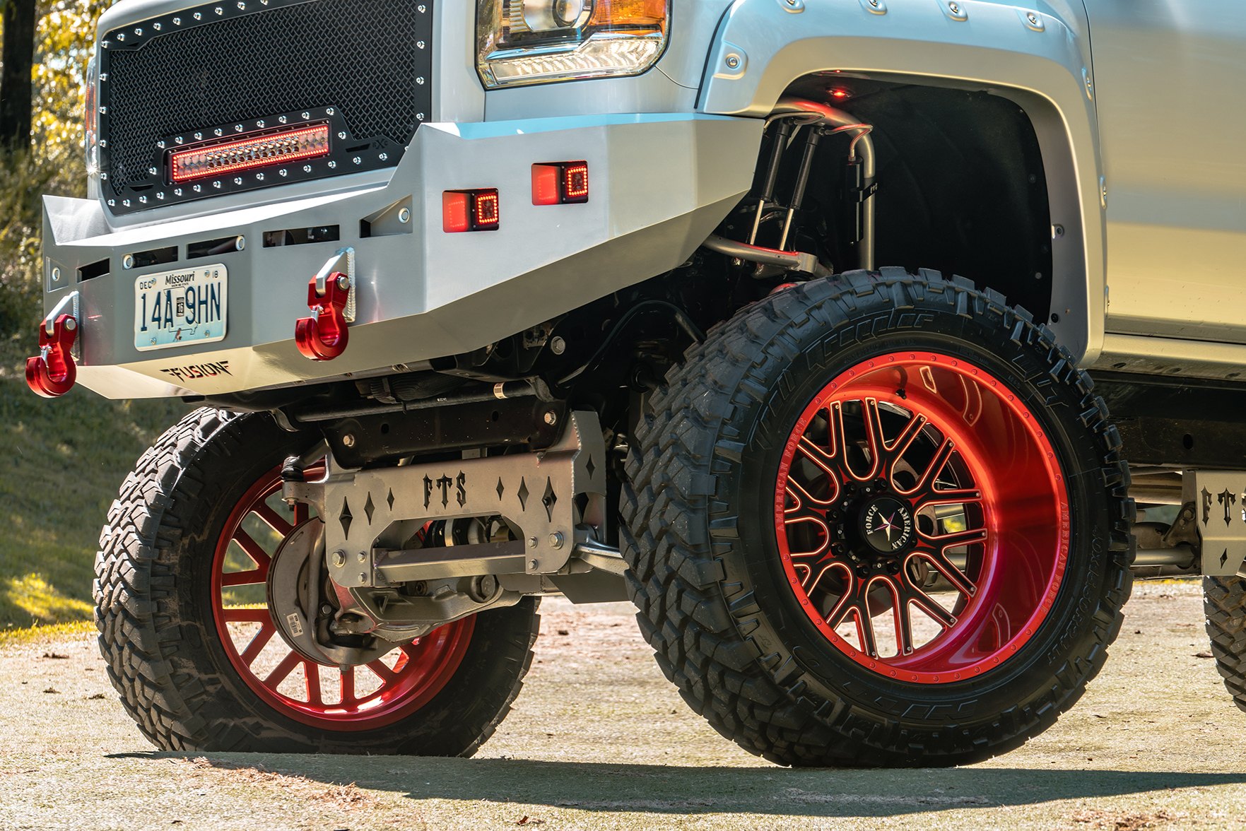 Lifted truck with 24» American forge custom wheels - Photo by American Force