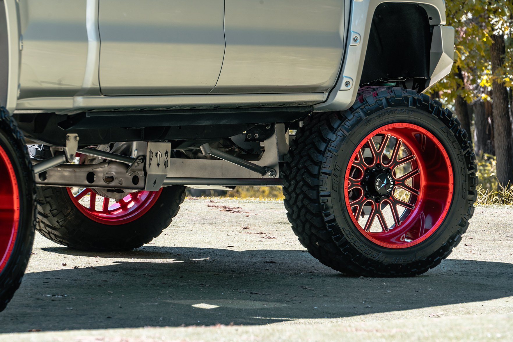 GMC Sierra 1500 with 40x15.5r24 American Forge Wheels - Photo by American Force