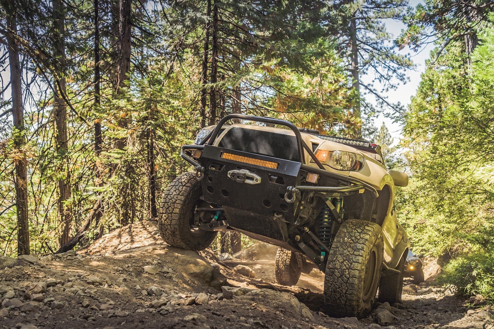Toyota Tacoma wheeling on the trails - Photo by Grillcraft