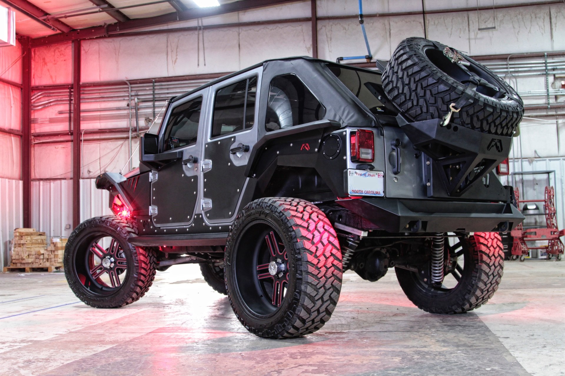 JK wrangler with Fab Fours spare tire carrier and off-road fender flares - Photo by Jason Bukolt (LFTD & LVLD Magazine)