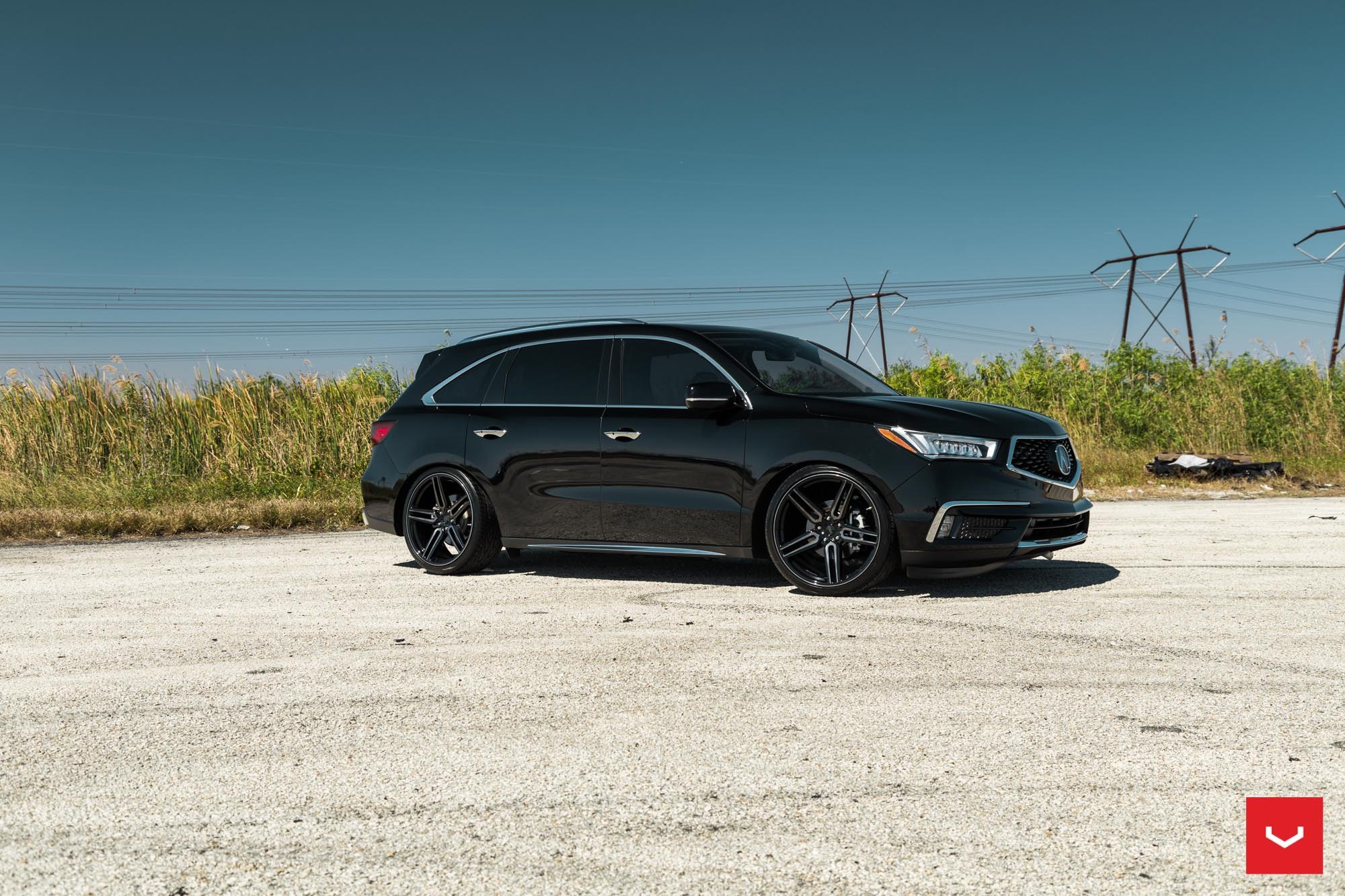 Aftermarket Side Skirts on Black Acura MDX - Photo by Vossen