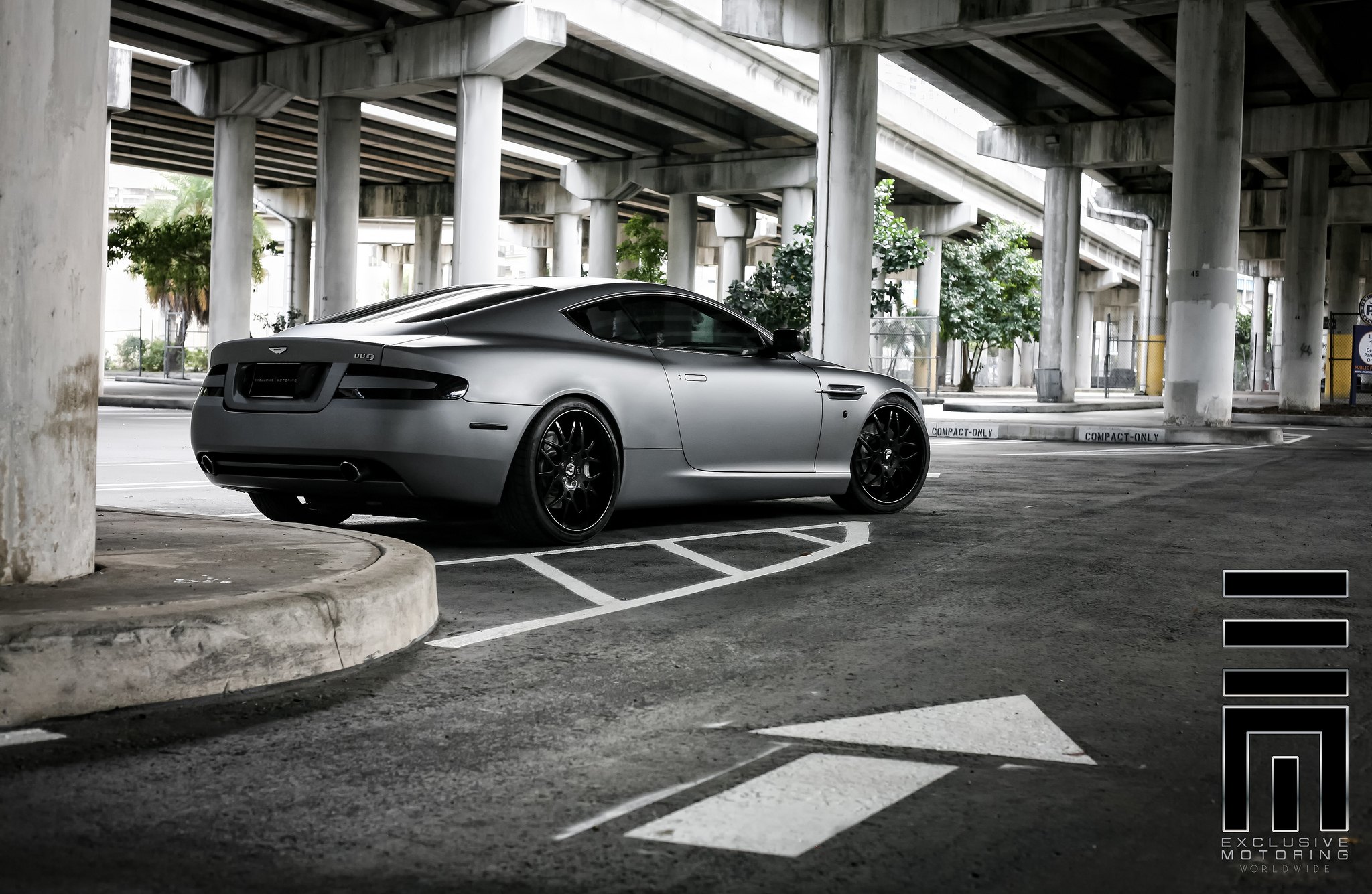 Gray Graphite Aston Martin sitting on Forgiato Wheels - Photo by Exclusive Motoring