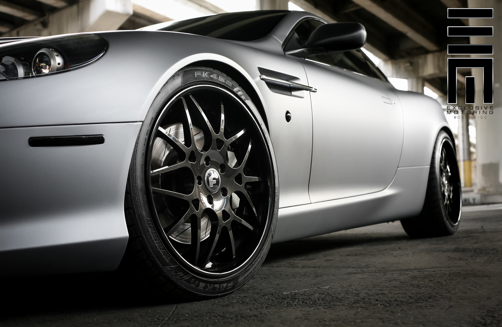 Luxury Aston Martin rocking gloss black Forgiato Wheels - Photo by Exclusive Motoring