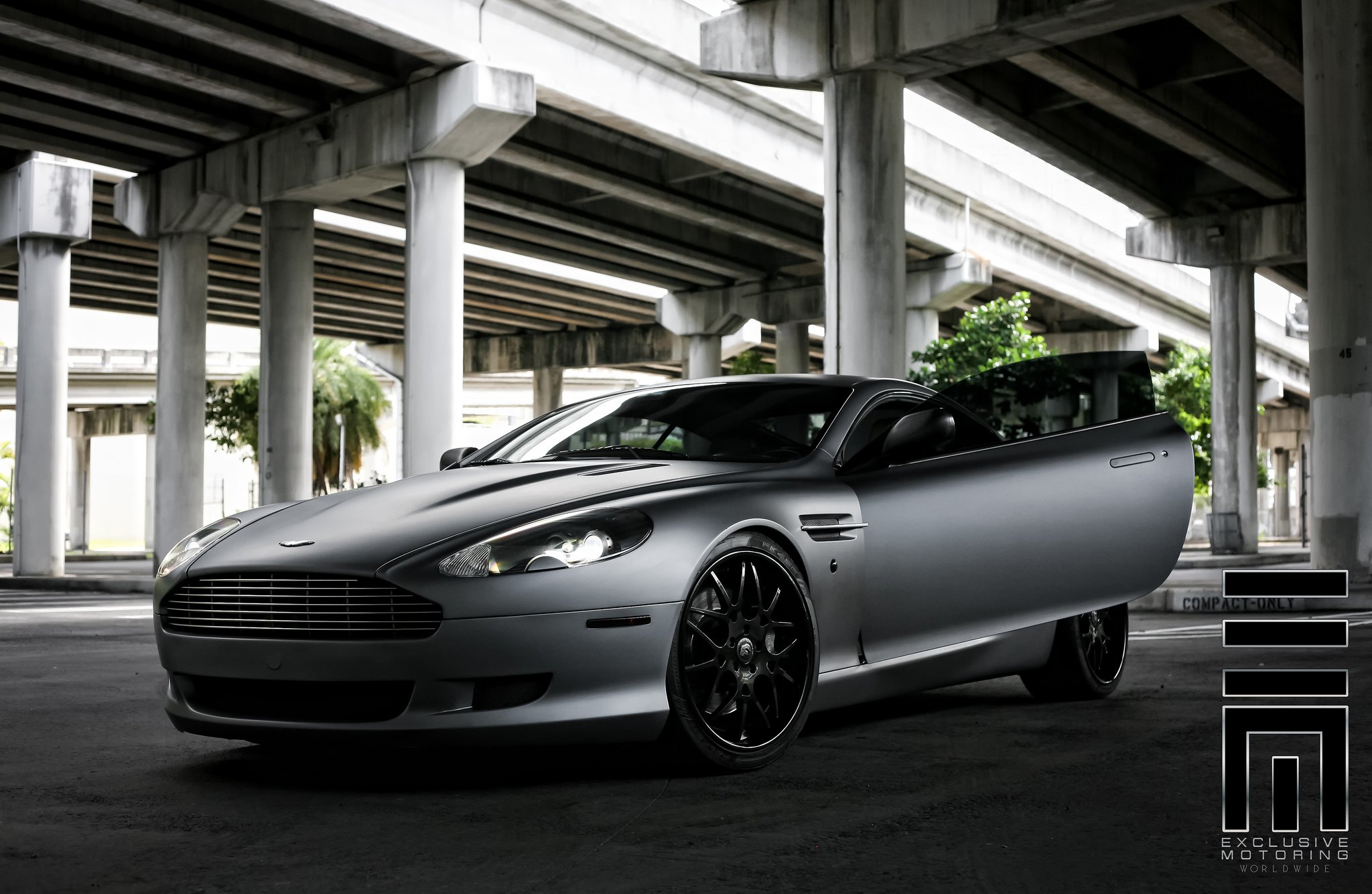 Side view of Gray Graphite Aston Martin - Photo by Exclusive Motoring
