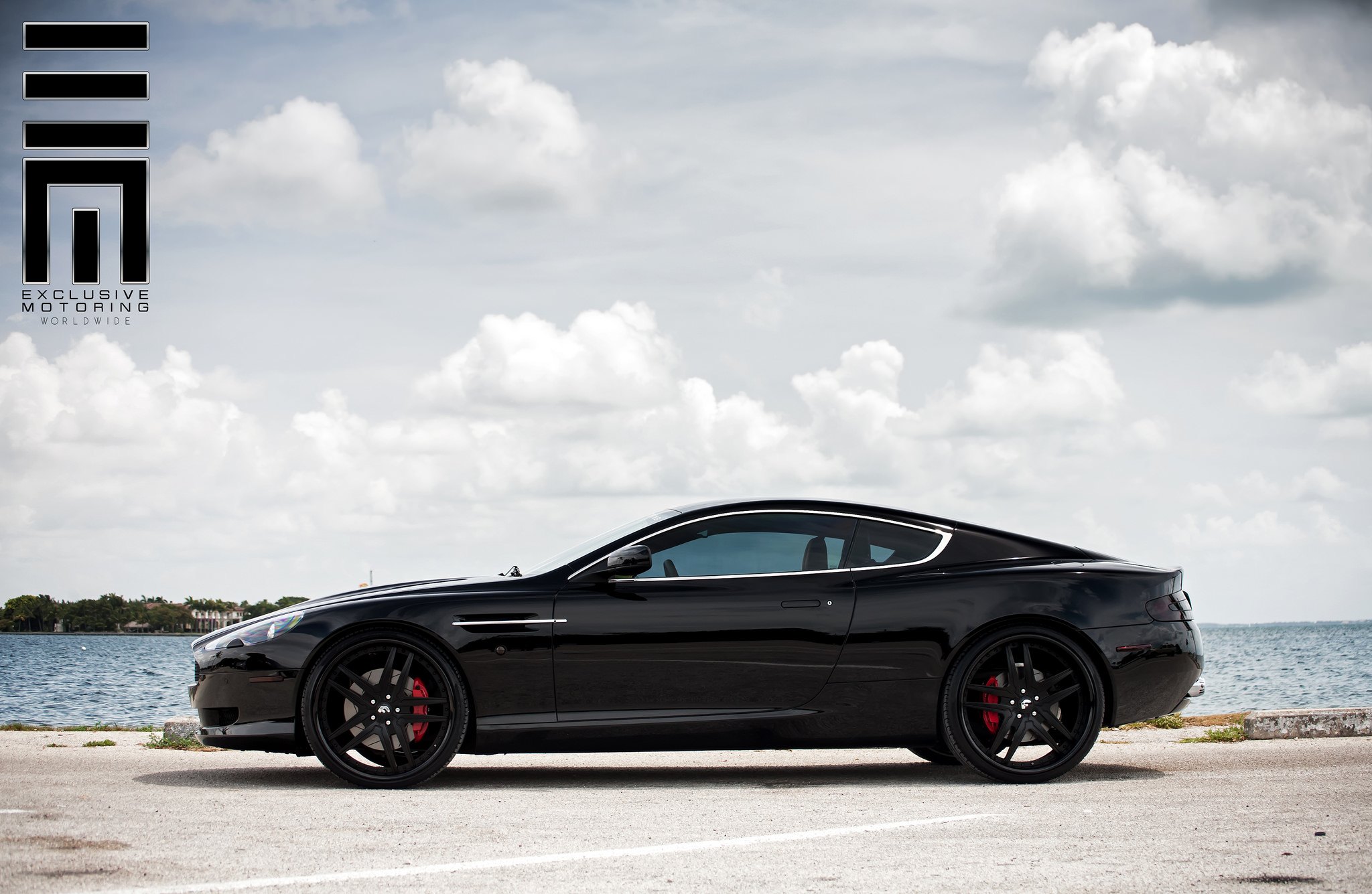 Aston Martin DB9 on a set of wheels with custom caliper cover - Photo by Exclusive Motoring