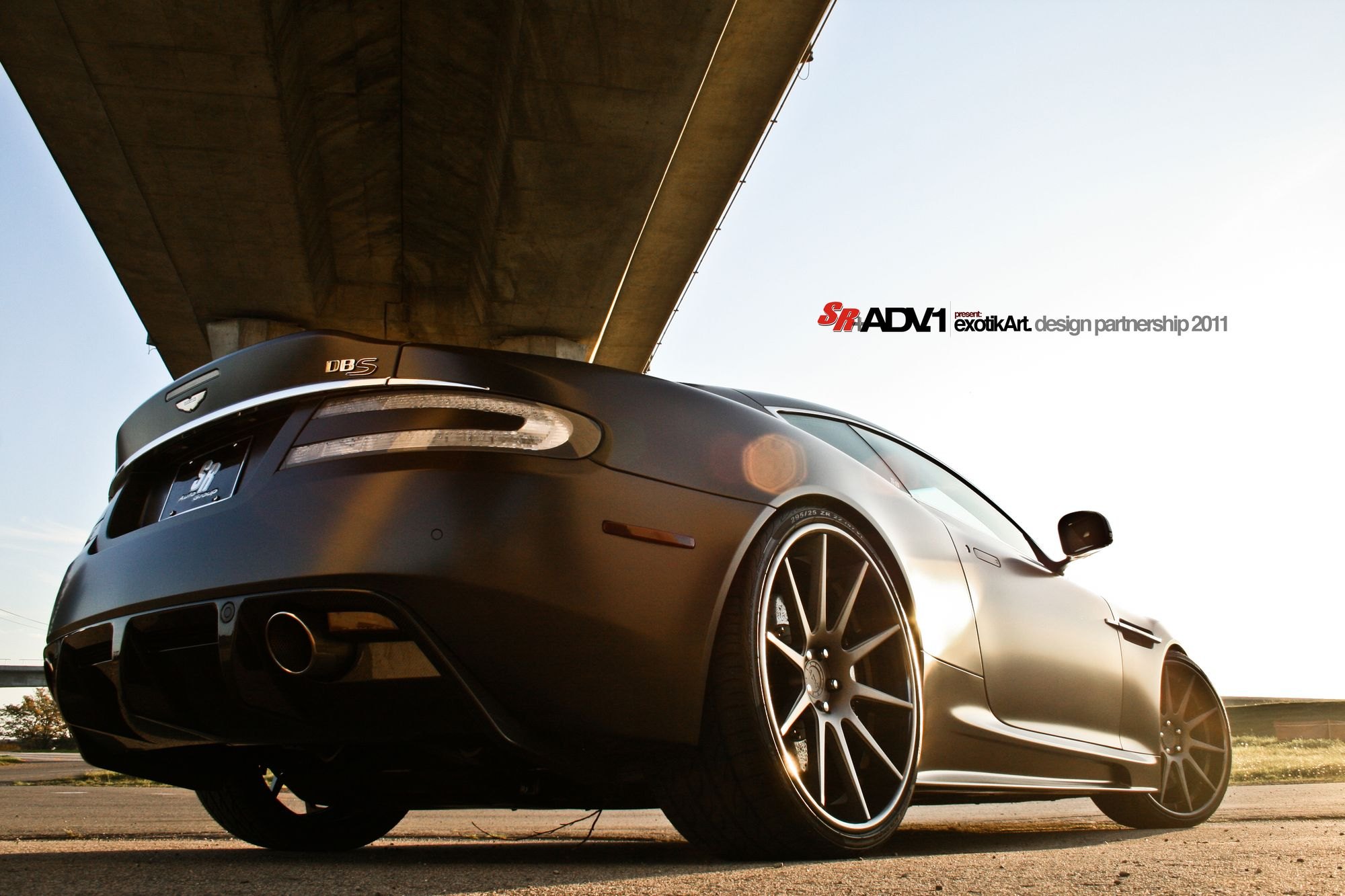 Aftermarket Rear Diffuser on Black Aston Martin DBS - Photo by ADV.1