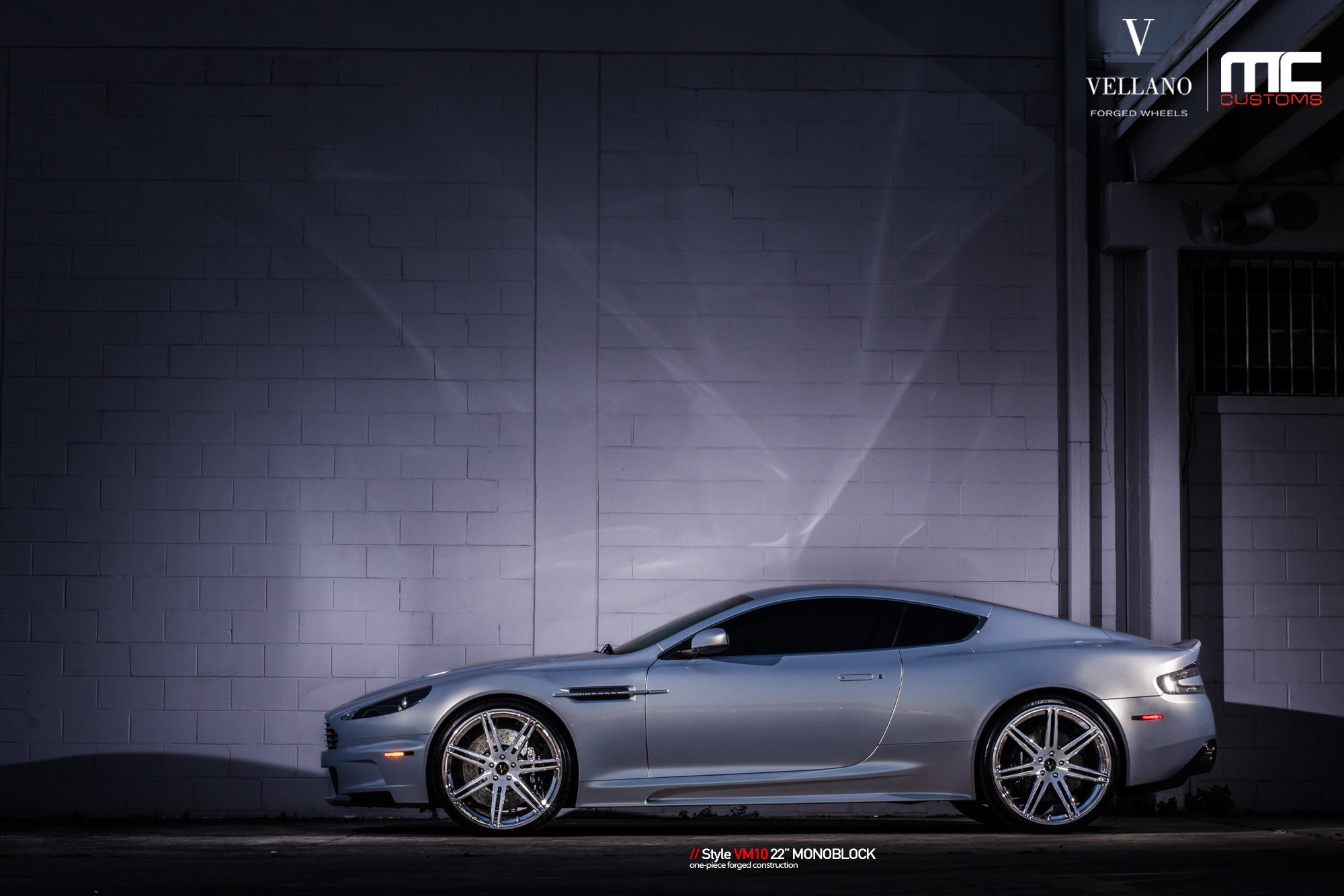 Aftermarket Side Skirts on Silver Aston Martin DBS - Photo by Vellano